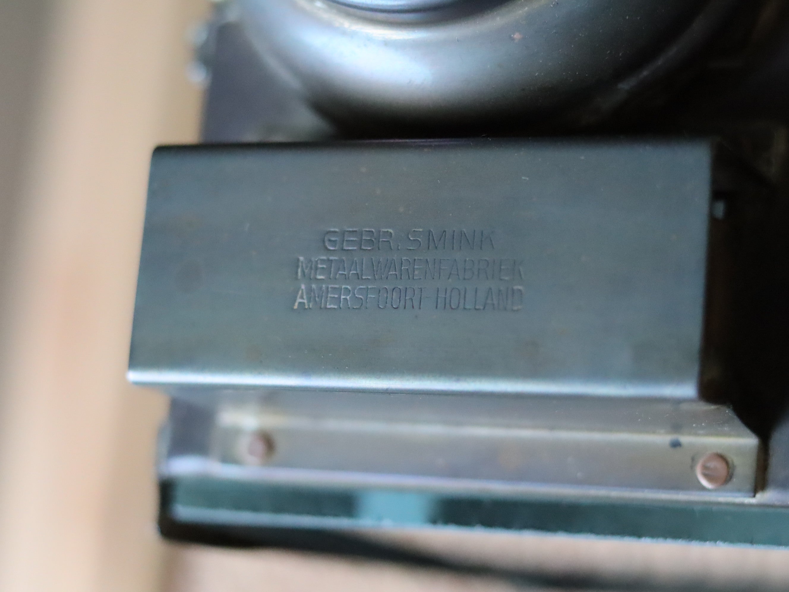 Close-up of Rare Heavy Railway Hand Lamp – Signal Lantern by Gebr. Smink (Amersfoort, 1920s/30s) showing brand engraving on oil lamp.
