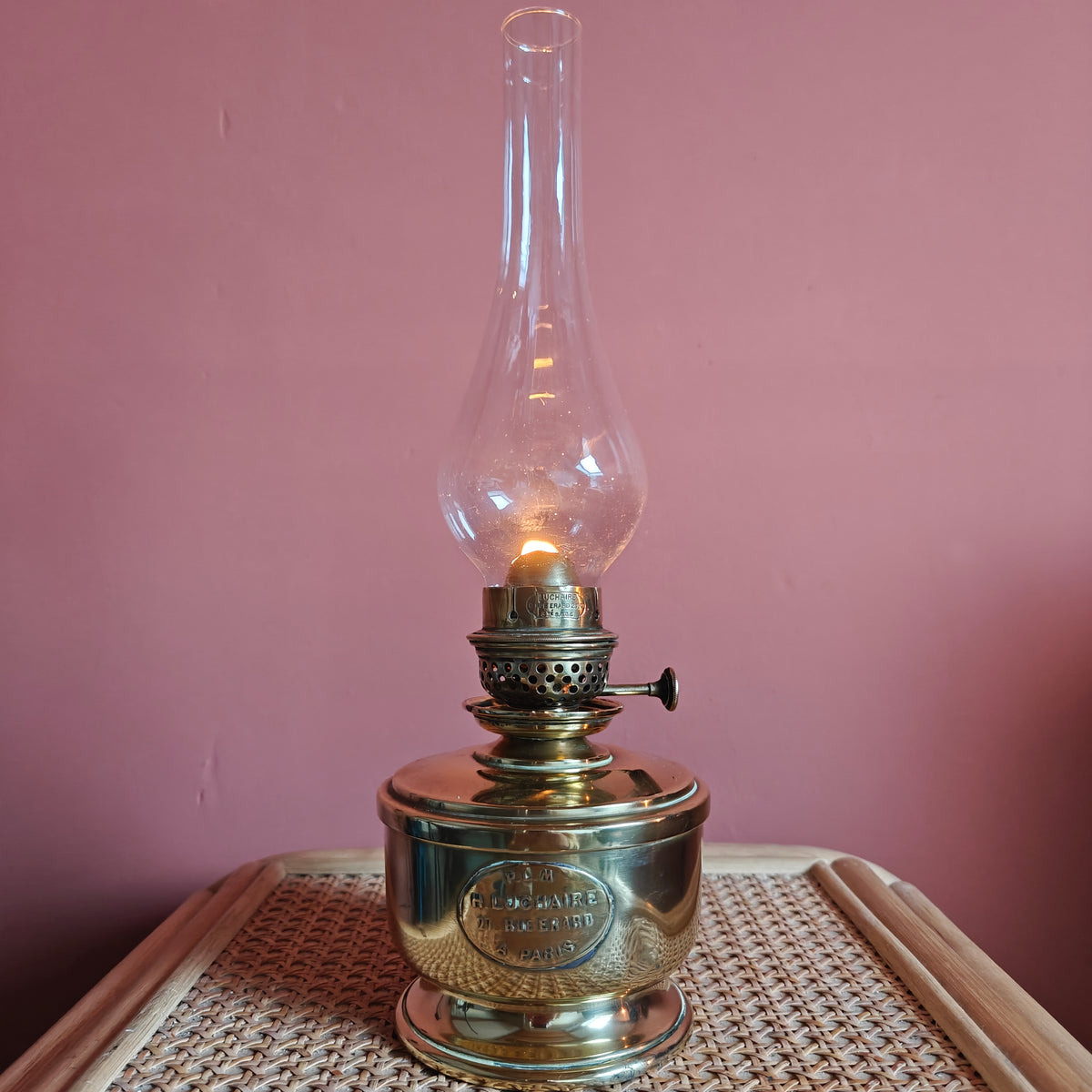 Rare Antique Table Oil Lamp – H. Luchaire PLM, Paris, Brass, Circa 1910, Fully Functional on wicker table against pink wall