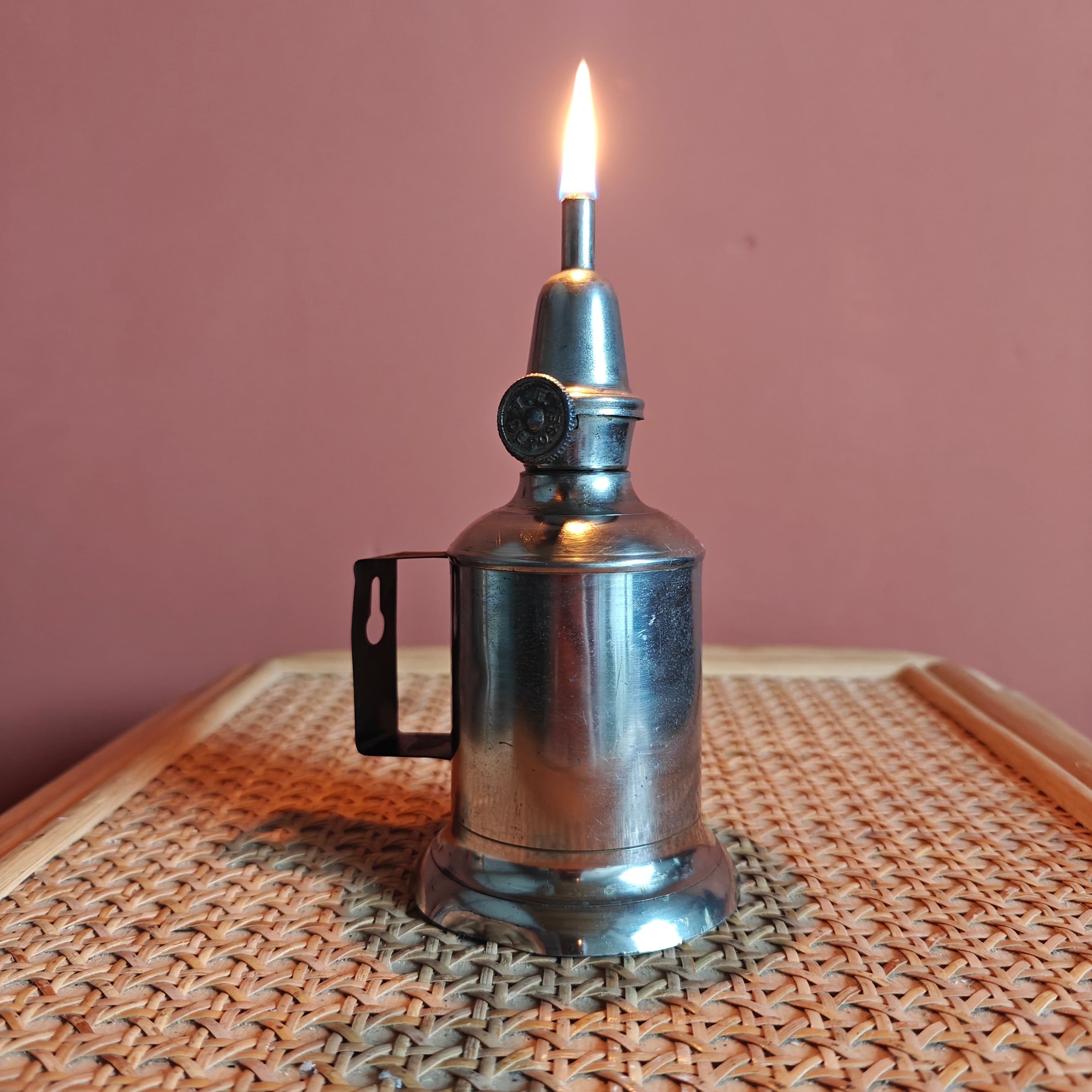 Vintage French Oil Lamp – Pigeon Style with T.F. Déposé Burner (17 cm) lit flame on metallic classic oil lamp