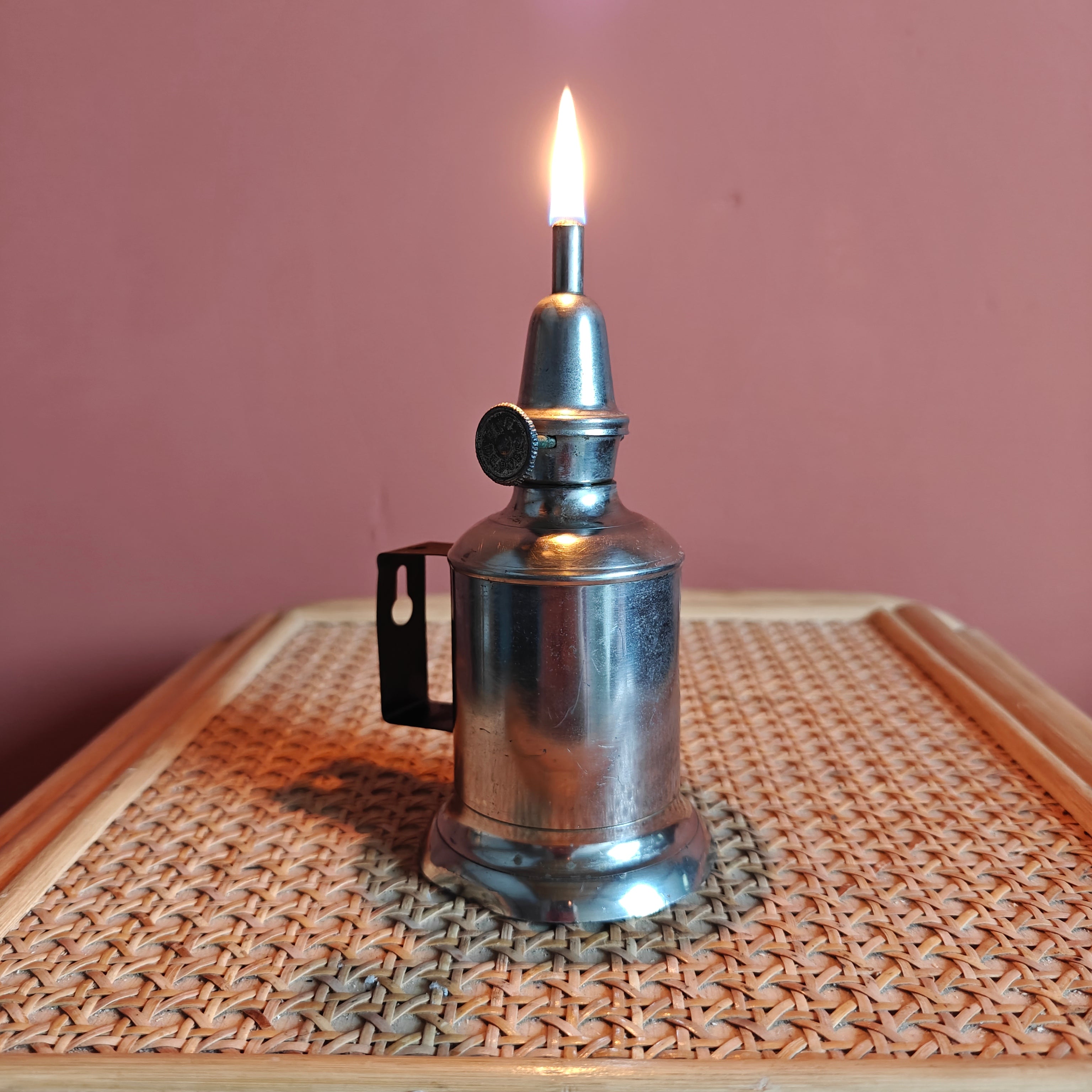 Vintage French Oil Lamp – Pigeon Style with T.F. Déposé Burner (17 cm) lit, metal design on patterned surface