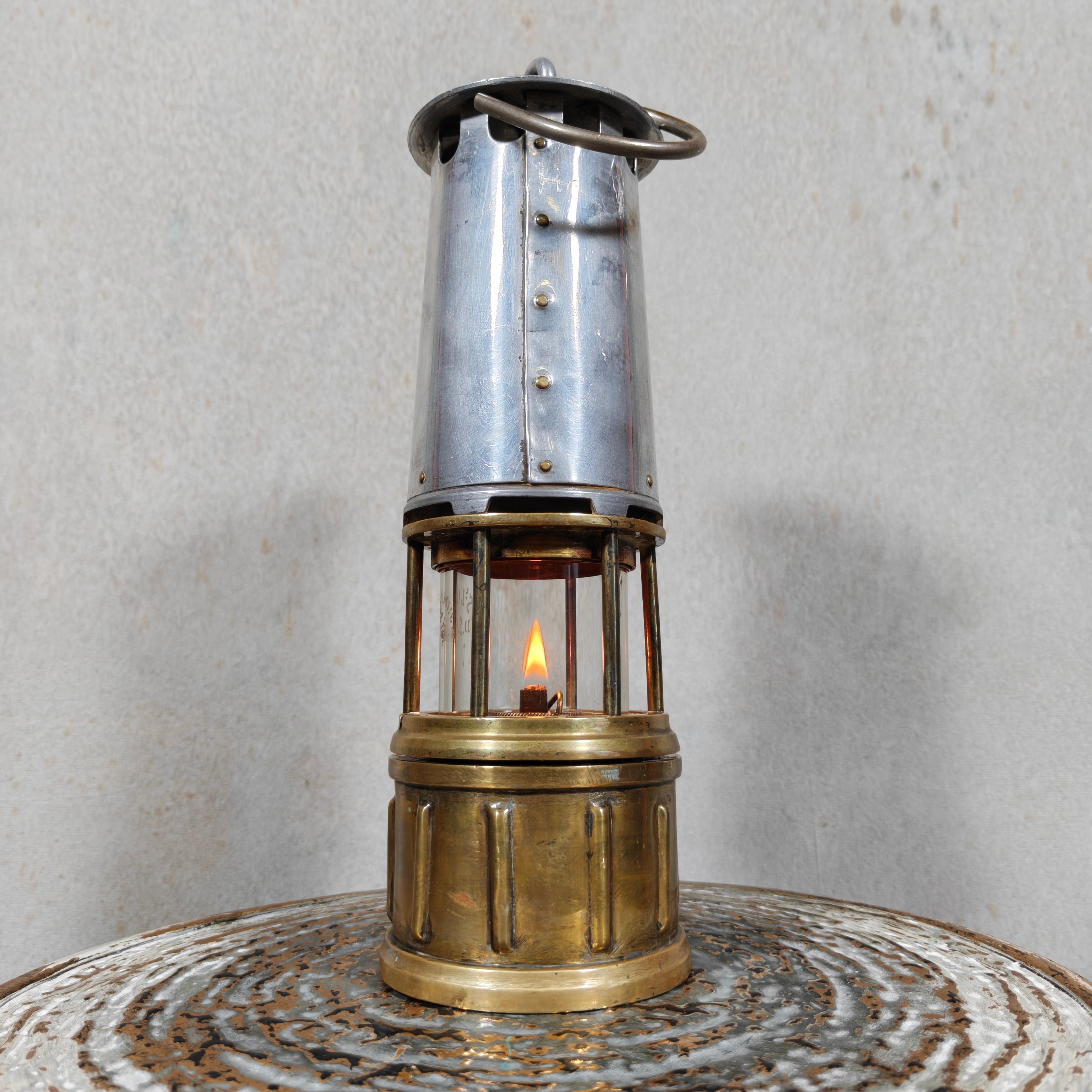Beautiful, Miner’s Lamp – ca. 1900 – With Val St. Lambert D.S.4 Glass vintage oil lamp with lit flame and metal casing