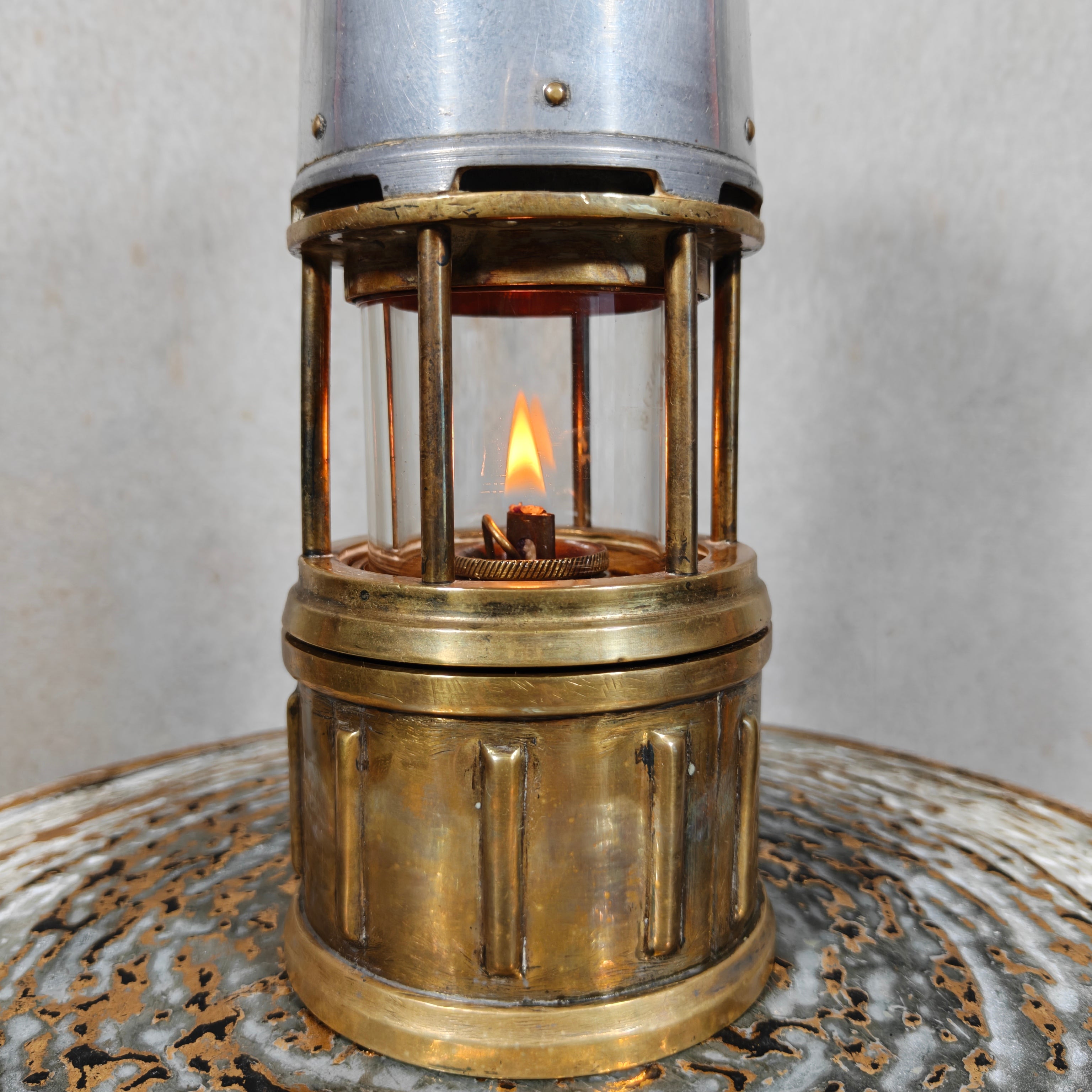 Beautiful, Miner’s Lamp – ca. 1900 – With Val St. Lambert D.S.4 Glass showing a lit vintage oil lamp flame.