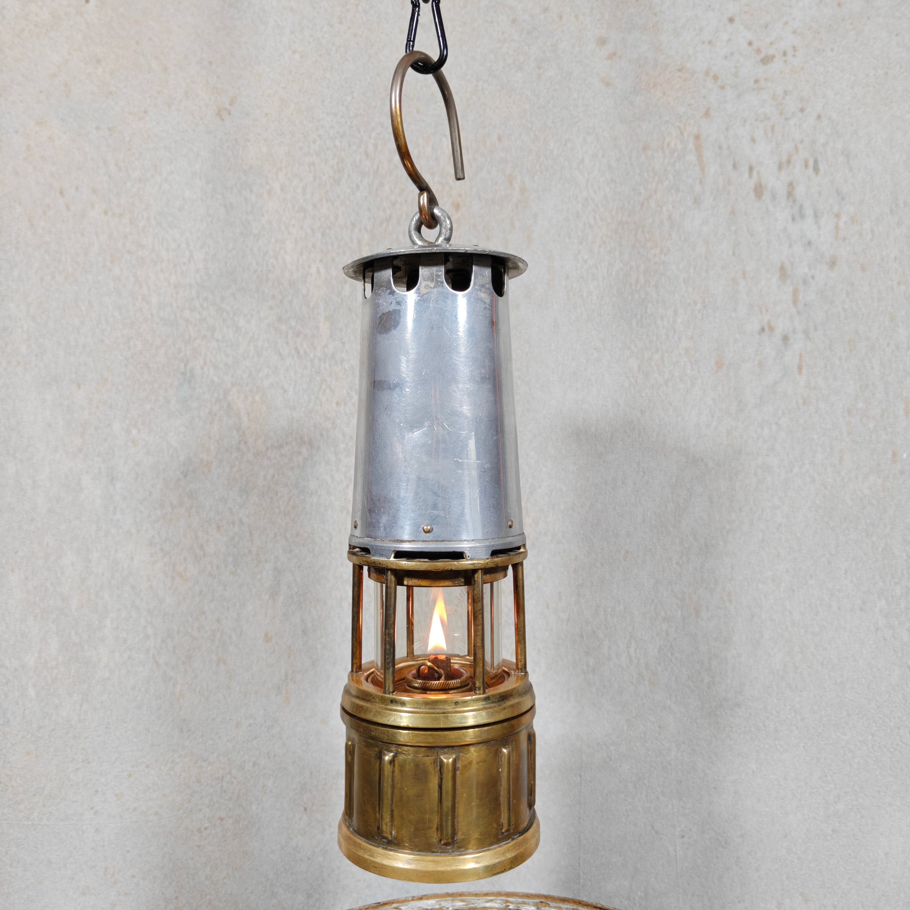Beautiful, Miner’s Lamp – ca. 1900 – With Val St. Lambert D.S.4 Glass showing antique oil lamp design and intricate brass details.