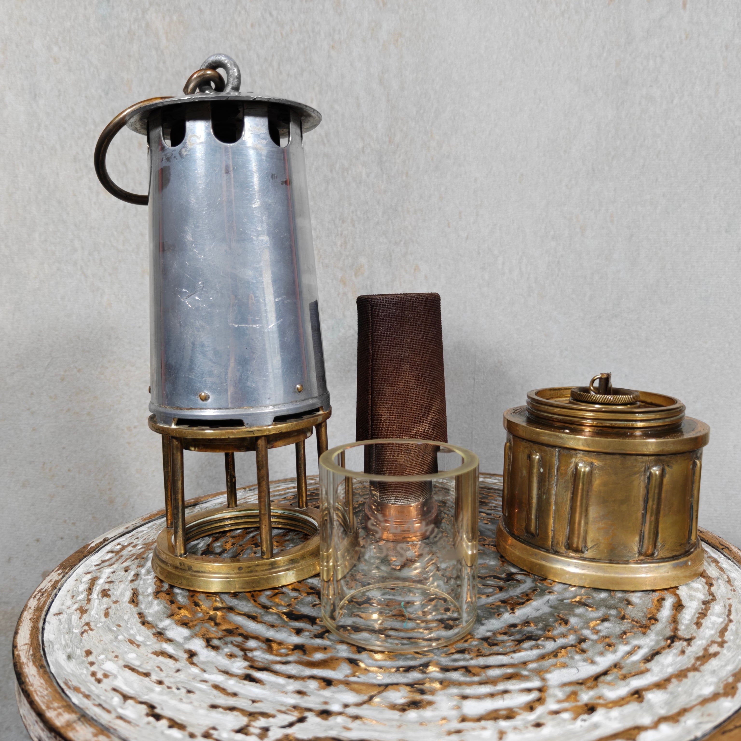 Beautiful, Miner’s Lamp – ca. 1900 – With Val St. Lambert D.S.4 Glass components of an antique oil lamp displayed.