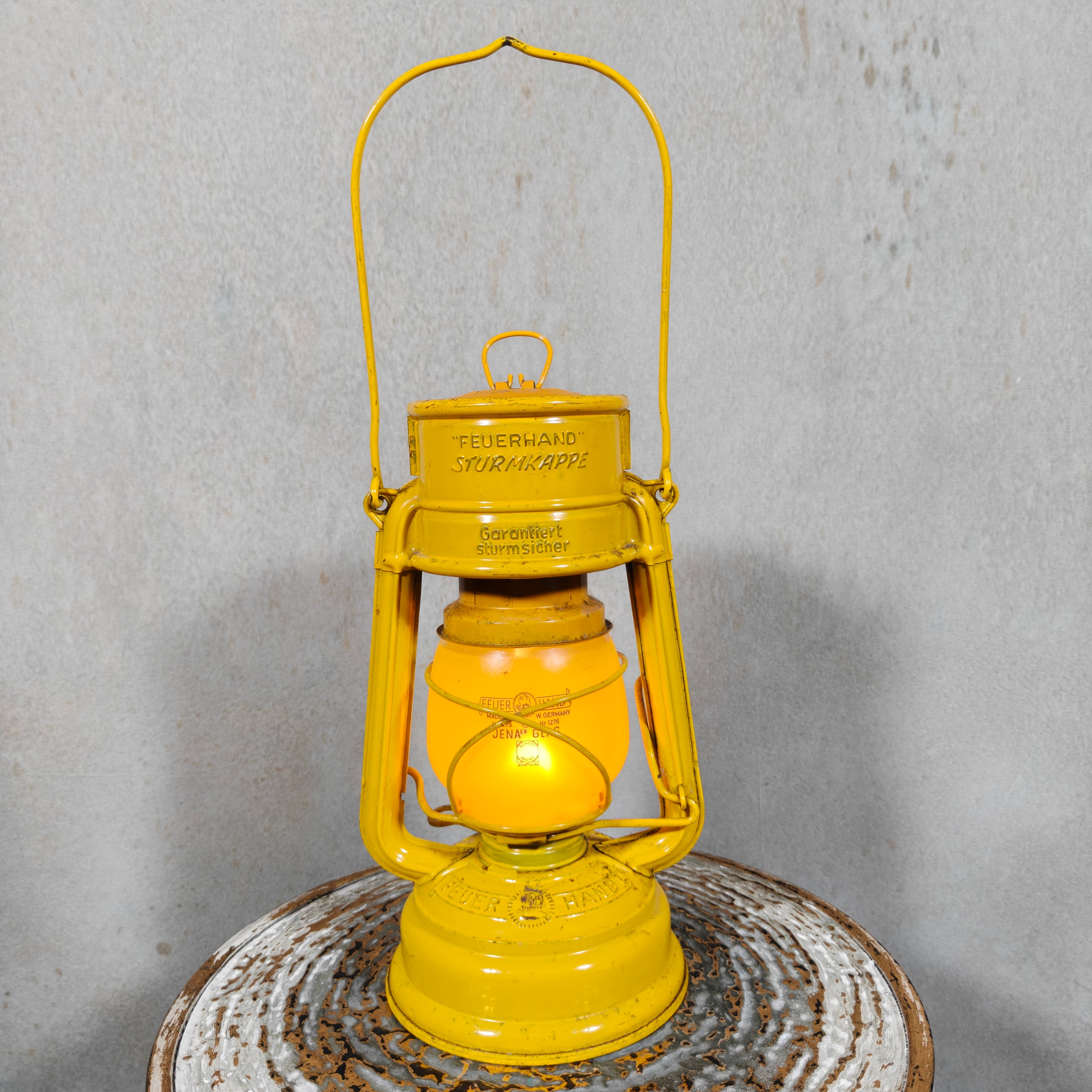 Beautiful Yellow Feuerhand Hurricane Lantern – Baby 276 STK/120 – Vintage Safety Lantern – Germany oil lamp close-up view