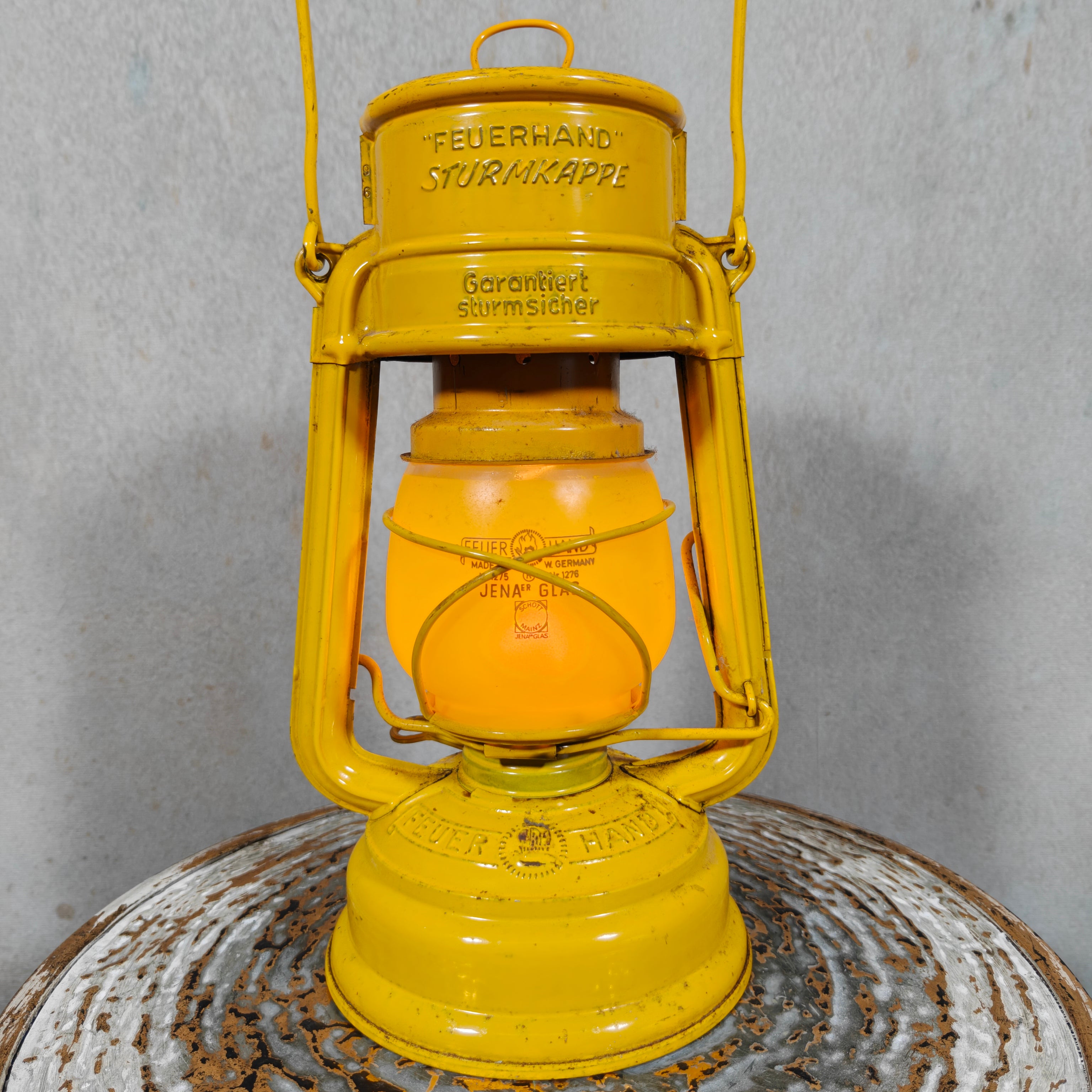 Beautiful Yellow Feuerhand Hurricane Lantern – Baby 276 STK/120 – Vintage Safety Lantern – Germany oil lamp close-up view