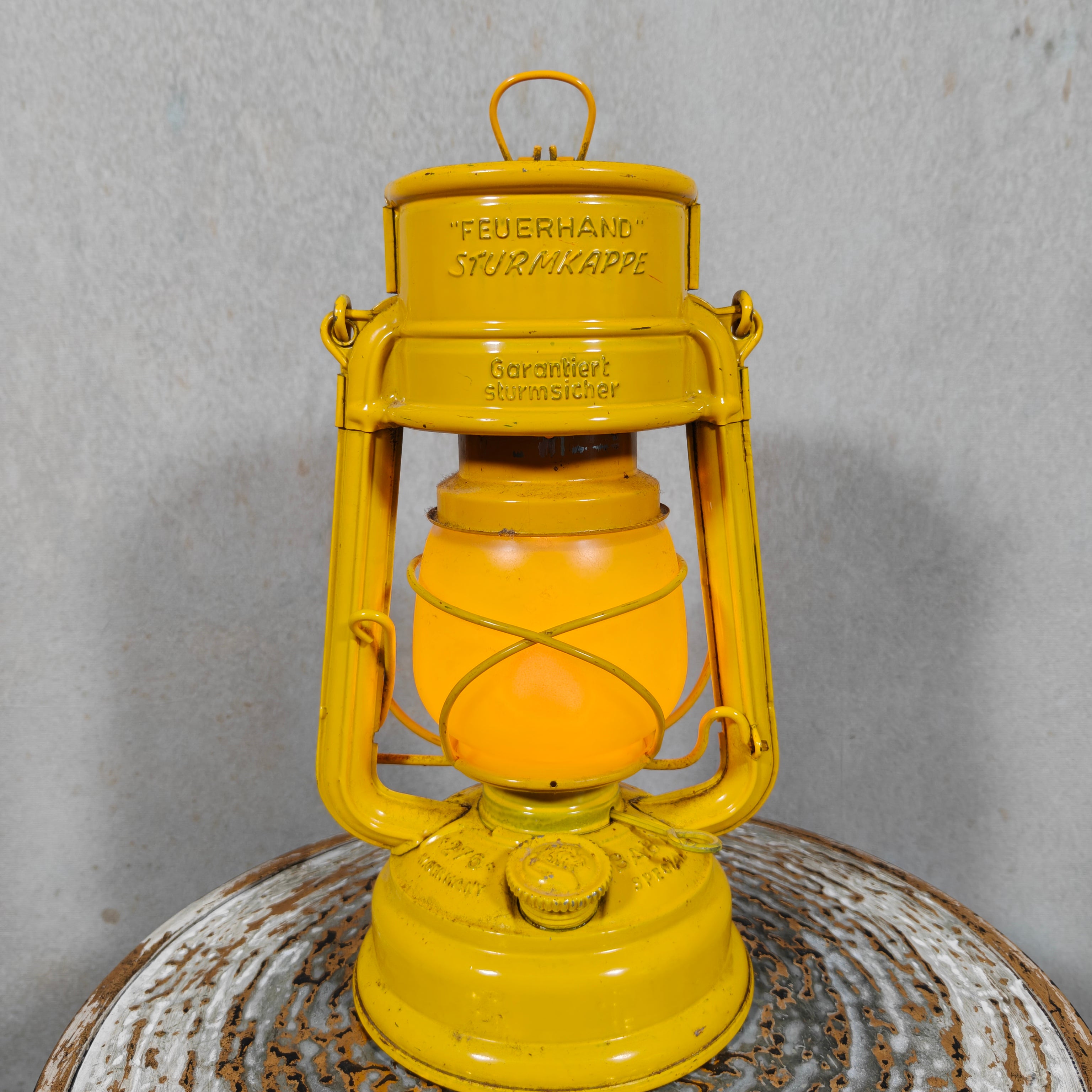Beautiful Yellow Feuerhand Hurricane Lantern – Baby 276 STK/120 – Vintage Safety Lantern – Germany oil lamp close-up view