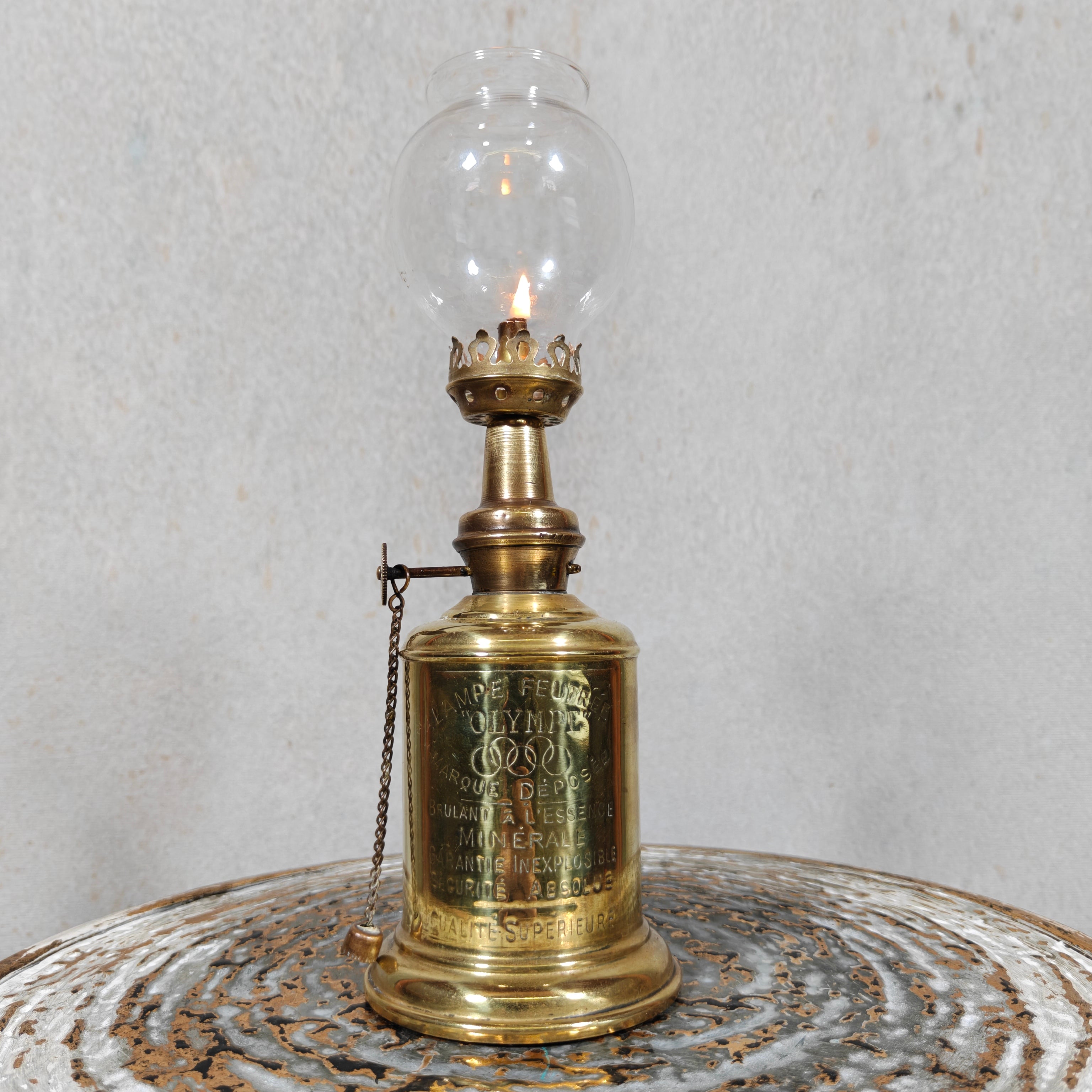 Vintage Oil Lamp – “Lampe Olympe” – Pigeon‑Style Lamp with Gaudard Wick Holder lit on rustic surface