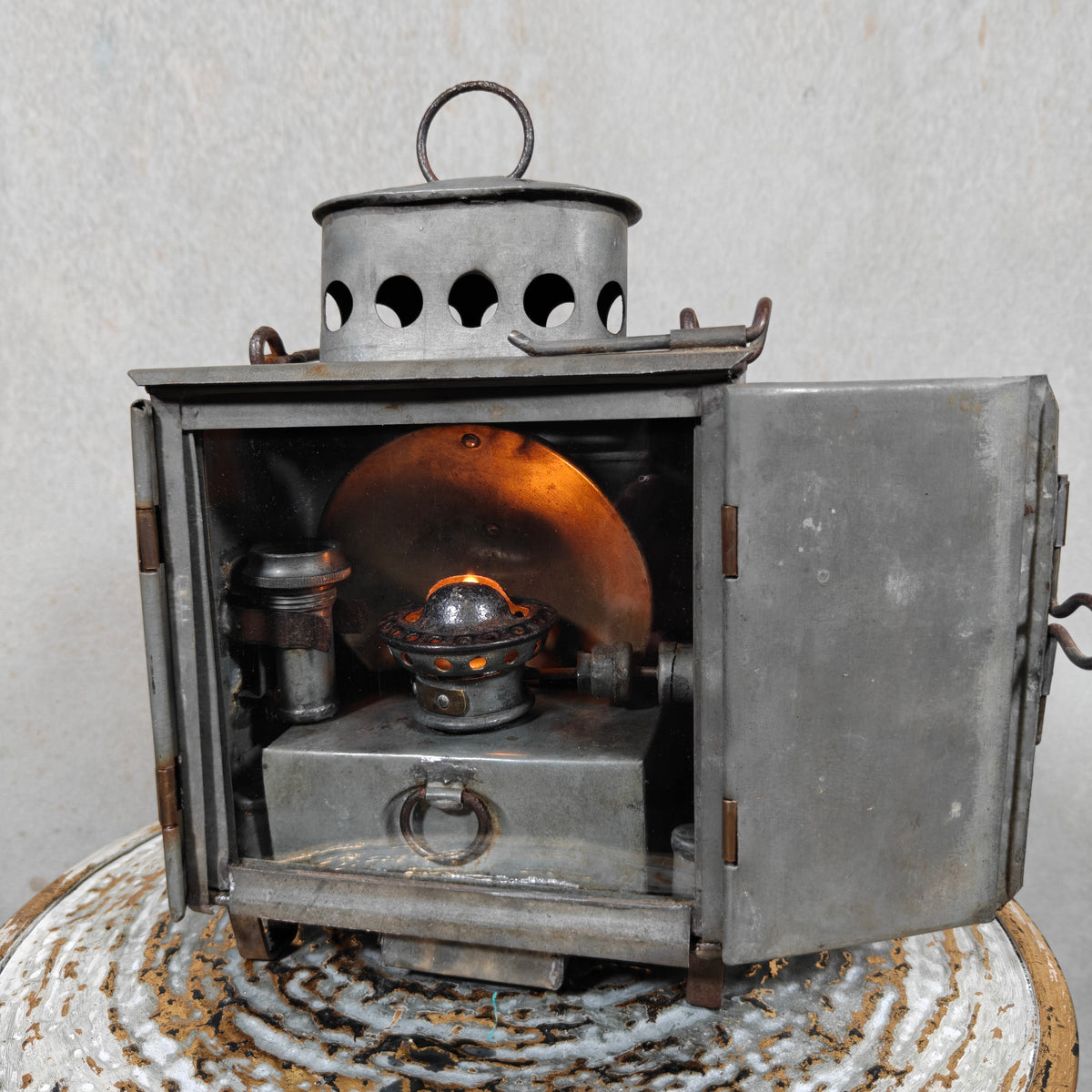Very Rare Oil and Candle Trench Lamp – “Weltlaterne” by J. Schwarz & Co., Berlin – 1910–1920 with open door showing oil lamp mechanism