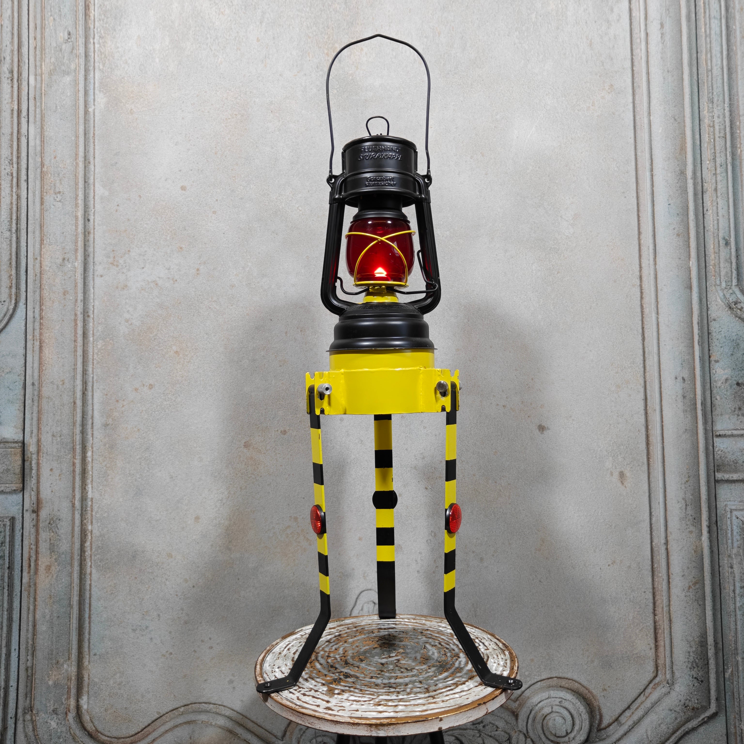 Fantastic and Unique Feuerhand 276 Breakdown Lantern – One‑of‑a‑Kind Custom Piece – Excellent Condition and Fully Usable oil lamp displayed on stand