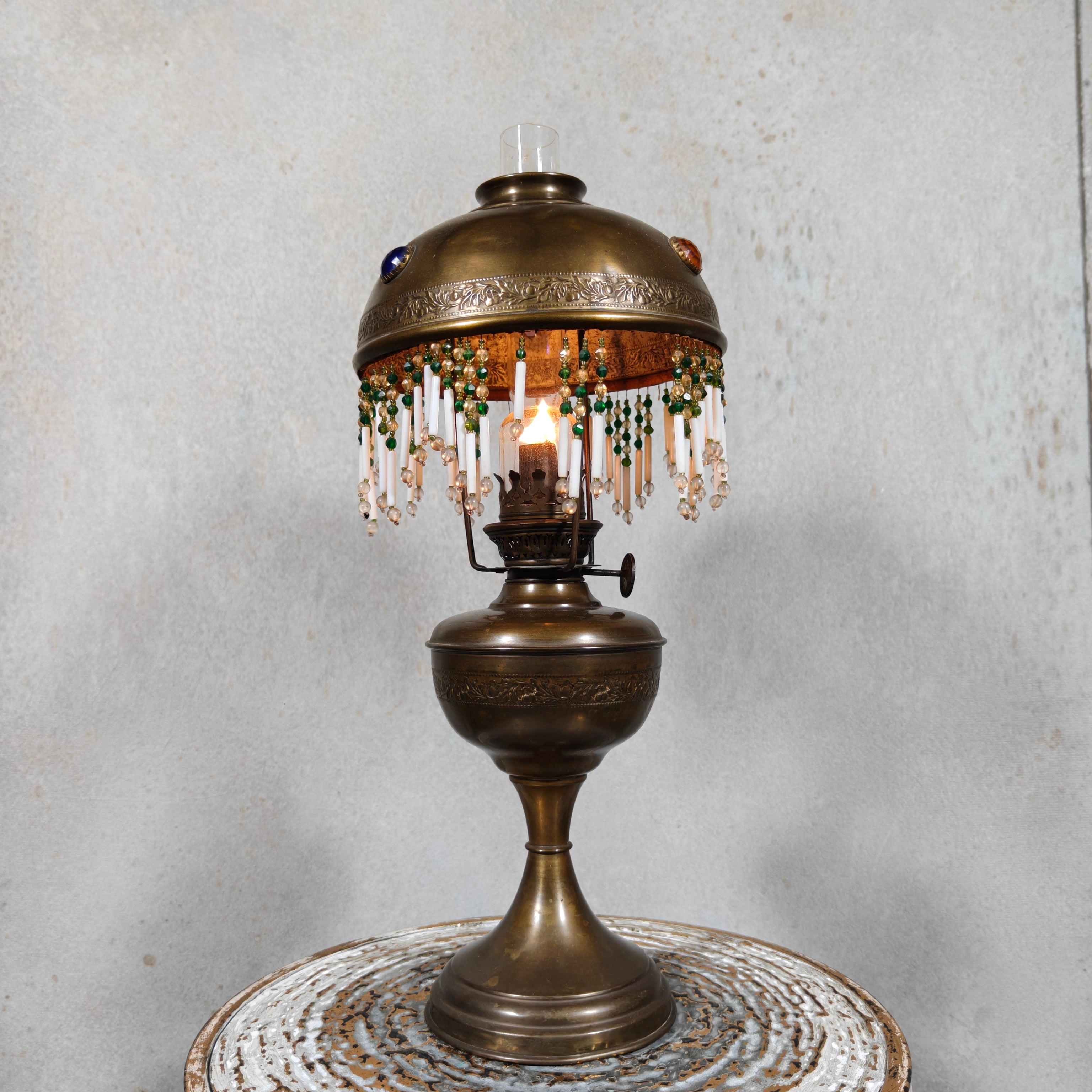 Ornate Brass Oil Lamp with Colored Glass Inserts and Beaded Details