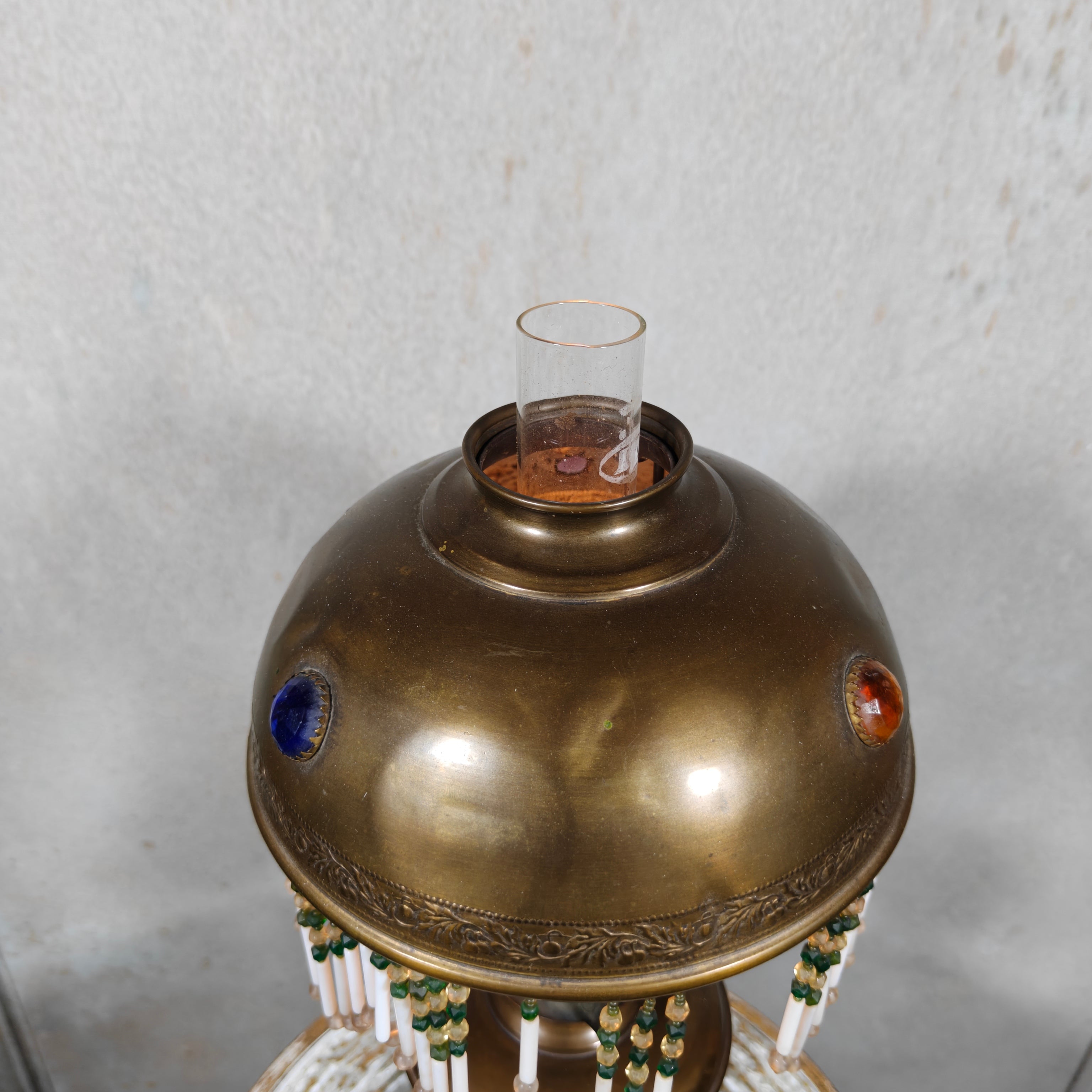 Ornate Brass Oil Lamp with Colored Glass Inserts and Beaded Details