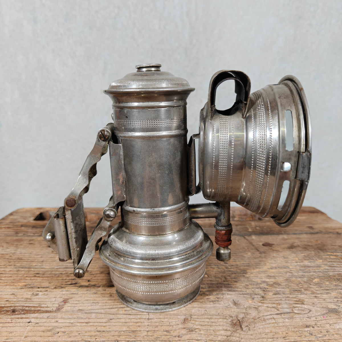 Unusual Antique Carbide Bicycle Lamp with Fly Logo – Nickel, c. 1900–1920 – Side-Mounted Tap