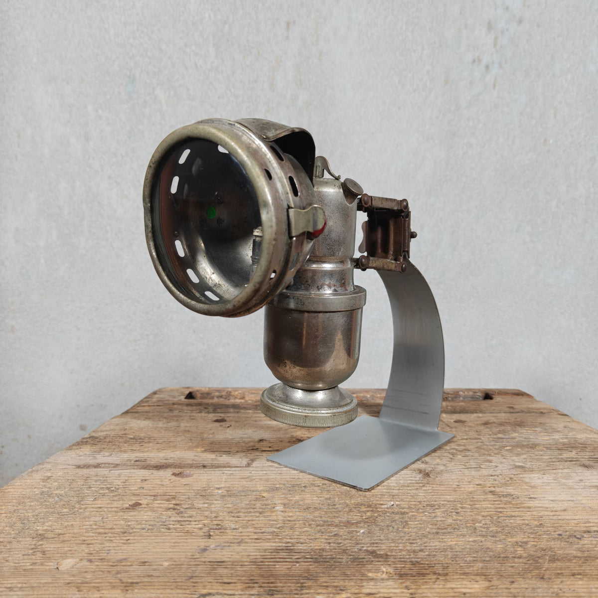 Antique Claridge Carbide Bicycle Lamp – Nickel, Red & Green Side Prisms, on Custom Stand