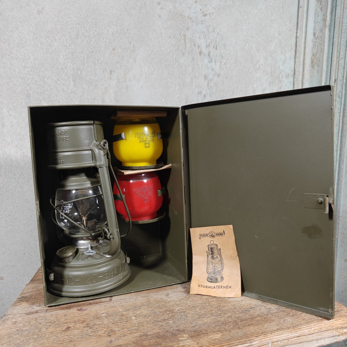 Vintage Feuerhand 276 Bundeswehr Hurricane Lantern Set in Metal Case – NOS, Two Coloured Spare Glasses, Manual