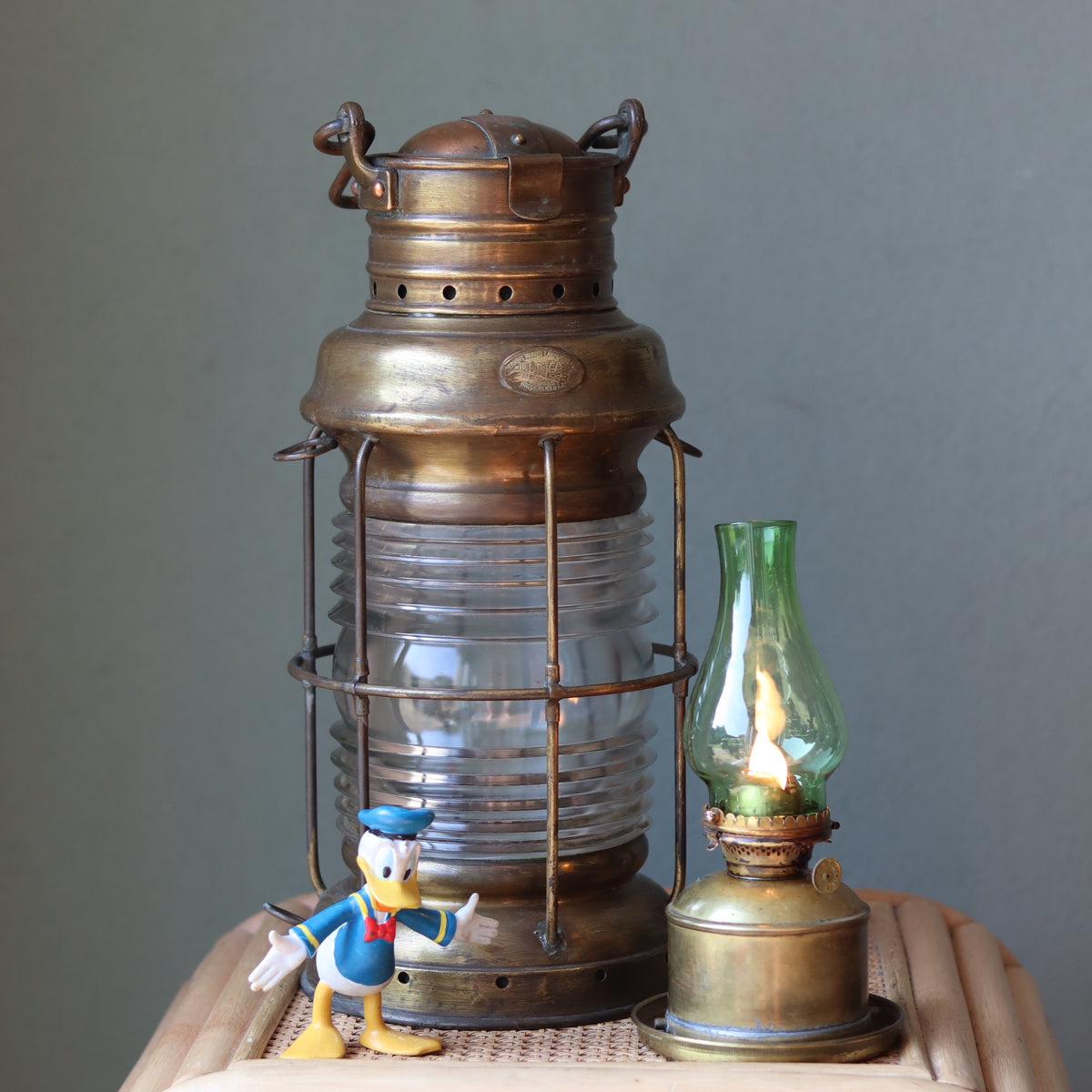 Vintage Perko Ship’s Lantern – Anchor Light (Copper, Brass & Bronze) with classic oil lamps showcasing maritime craftsmanship