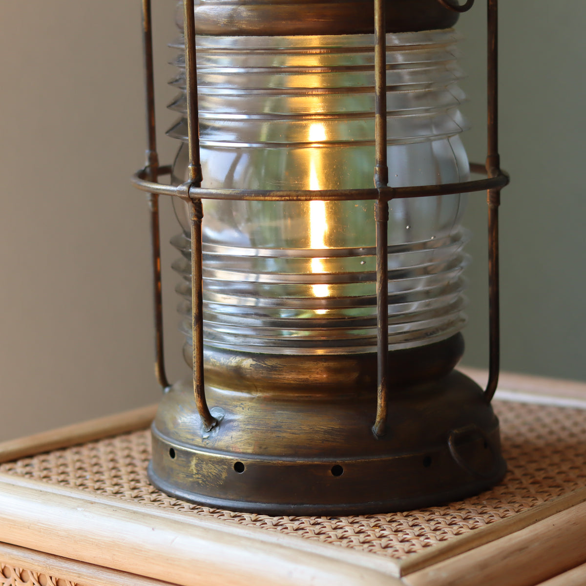 Vintage Perko Ship’s Lantern – Anchor Light (Copper, Brass & Bronze) showing lit oil lamp with protective cage