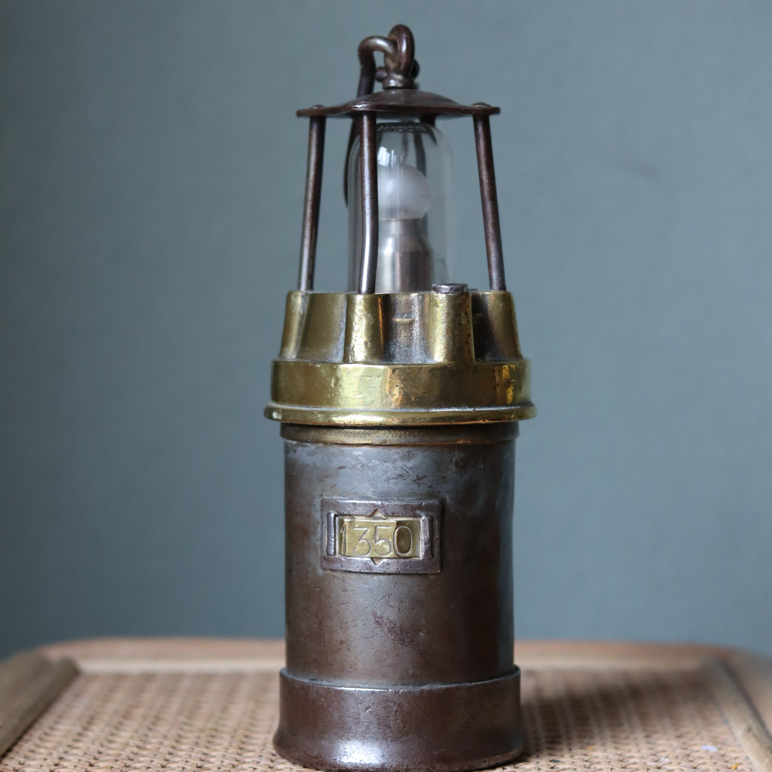 Vintage Mining Lamp – Pot Lamp – Numbered 1350 – Bronze & Steel – Circa 1950s–1960s oil lamp with metal cage and glass globe.
