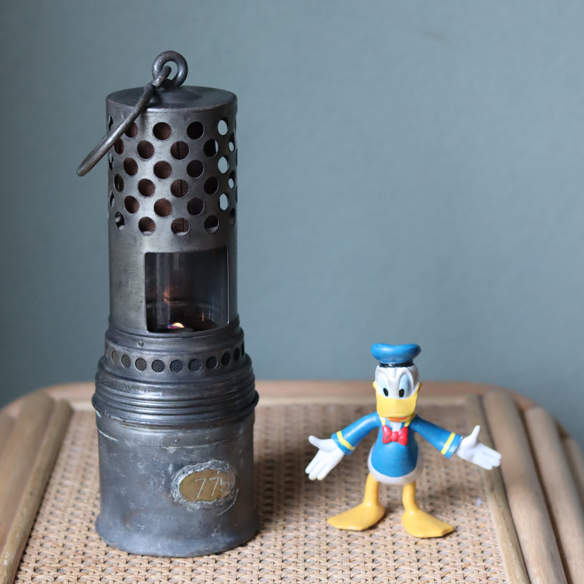Rare Vintage Lamp – Mining Lamp or Engine Heater Lamp – Numbered 775 – Circa 1940s–1950s with decorative collectible figure next to it