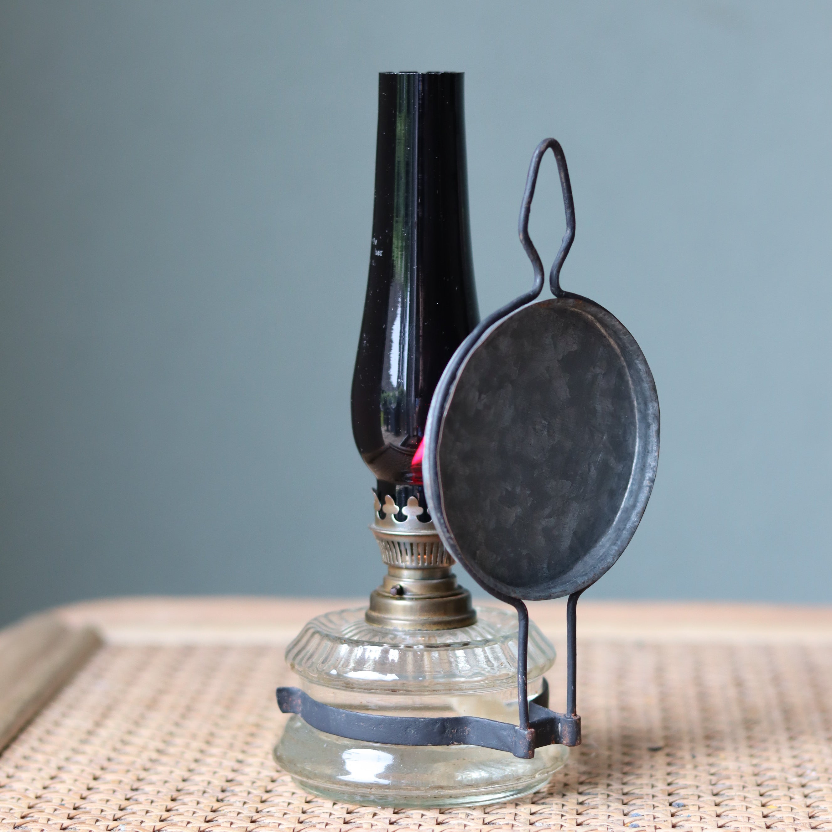 Rare Vintage Wall Oil Lamp – Red Glass Chimney by Gebr. Putzler featuring a classic 1900s–1950s kitchen lamp design.