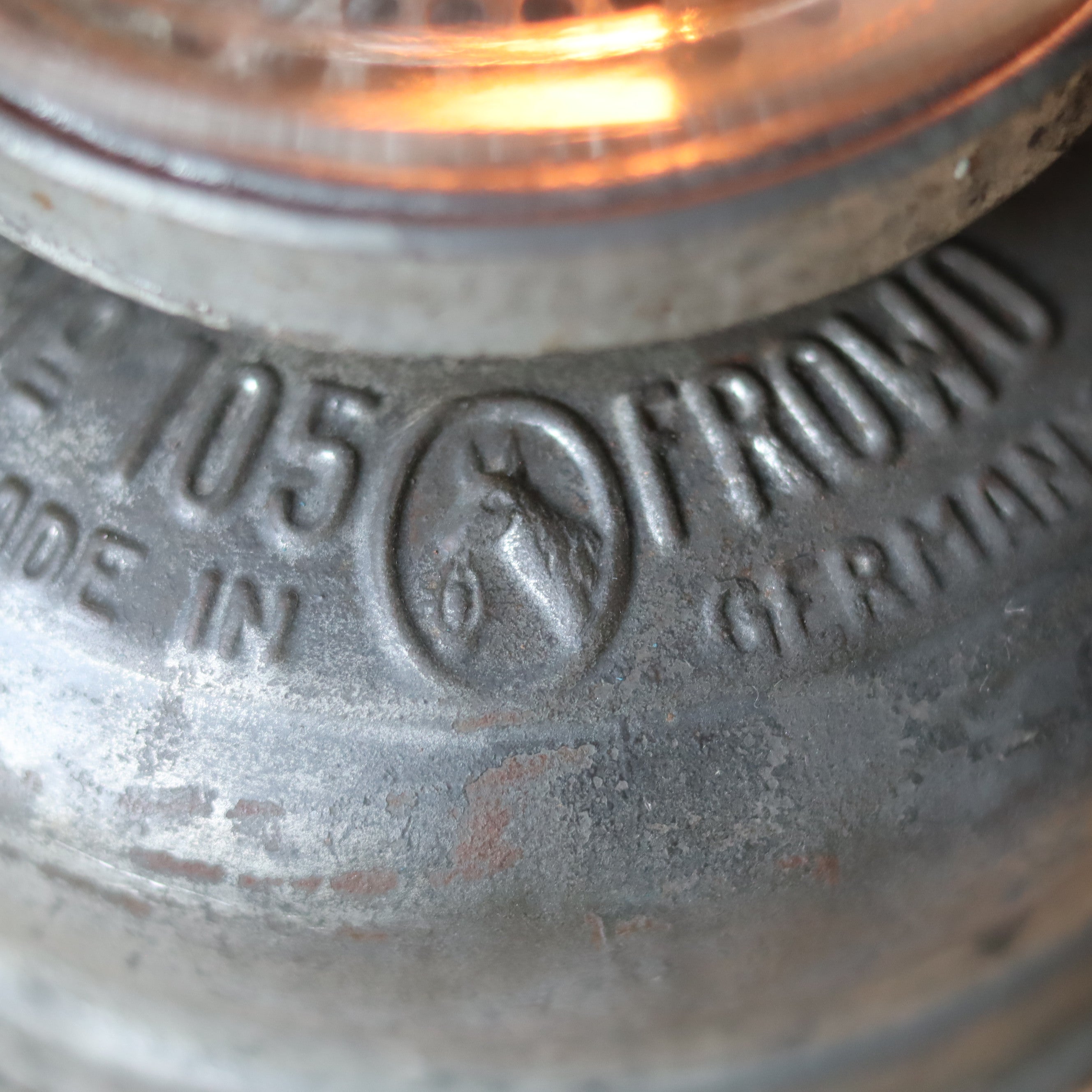 Rare Vintage Frowo 105 Hurricane Lantern – Pre-War/short post war Model with Dog Emblem close-up on metal logo detail