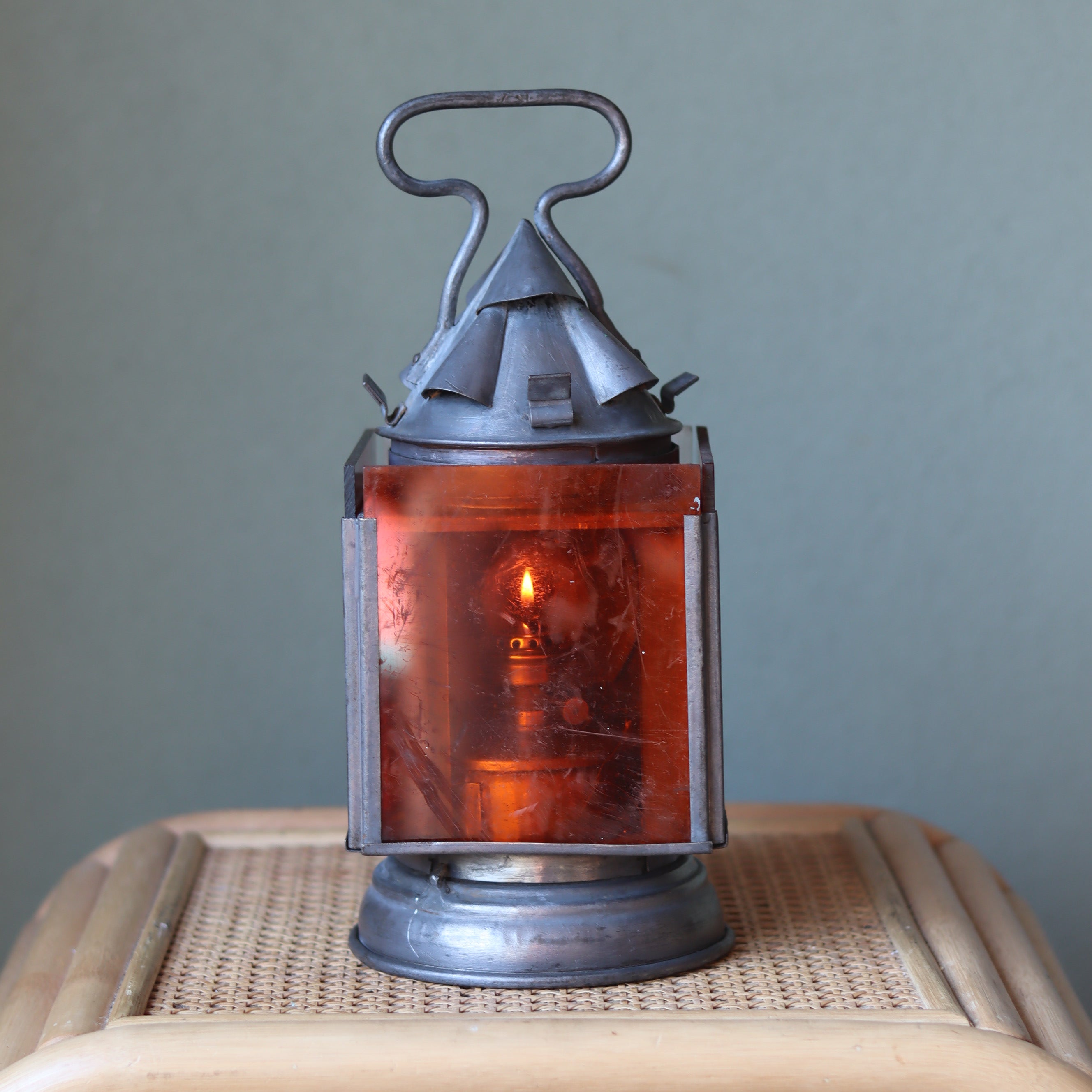 Vintage Railway Signal Lantern – Rare Collectible with 4 Colored Glass Panels showcasing an antique oil lamp lit inside.