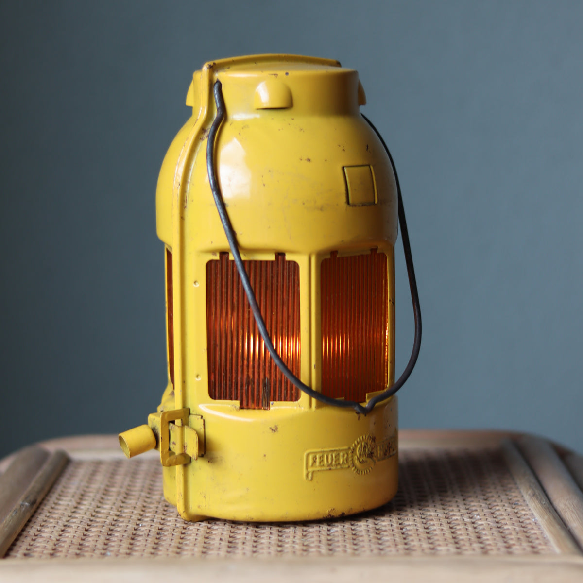 Vintage Feuerhand Yellow Roadwork Lantern – Tealight Safety Lamp (1960s/70s) in yellow metal with protective glass panels and metal handle