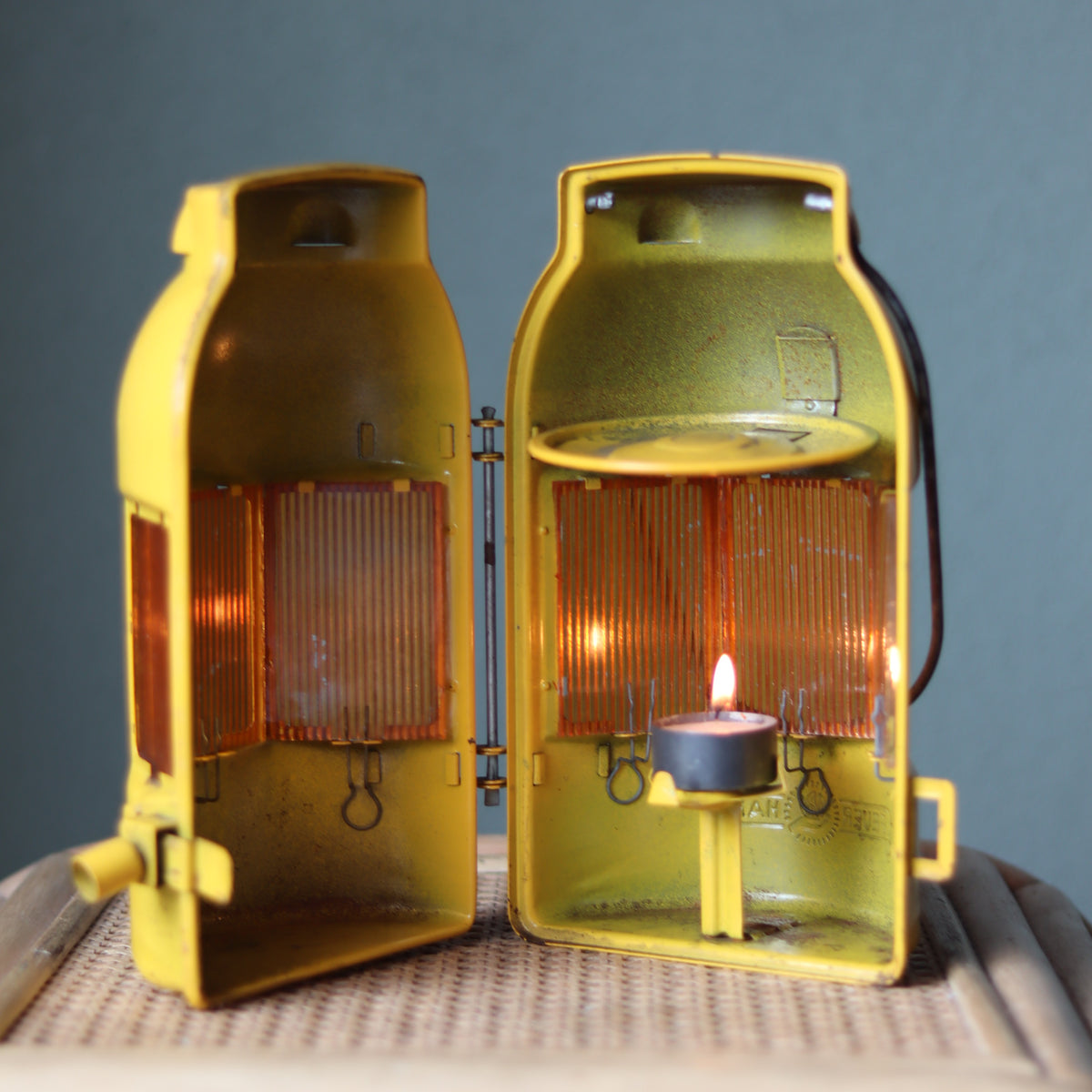 Vintage Feuerhand Yellow Roadwork Lantern – Tealight Safety Lamp (1960s/70s) showing oil lamp interior with lit tealight flame
