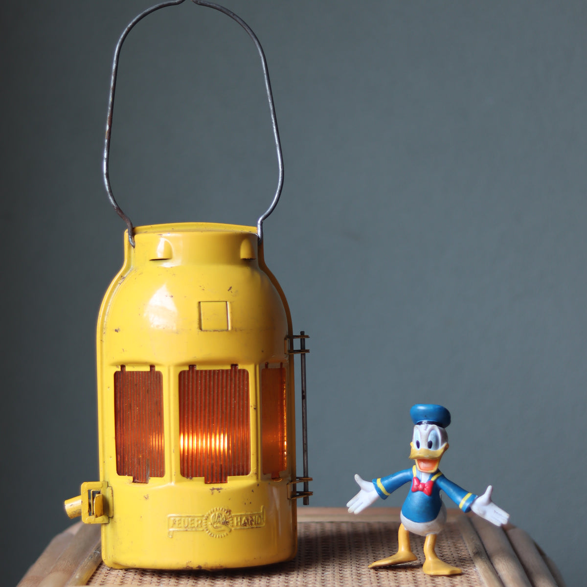 Vintage Feuerhand Yellow Roadwork Lantern – Tealight Safety Lamp (1960s/70s) with classic yellow oil lamp design and metal handle