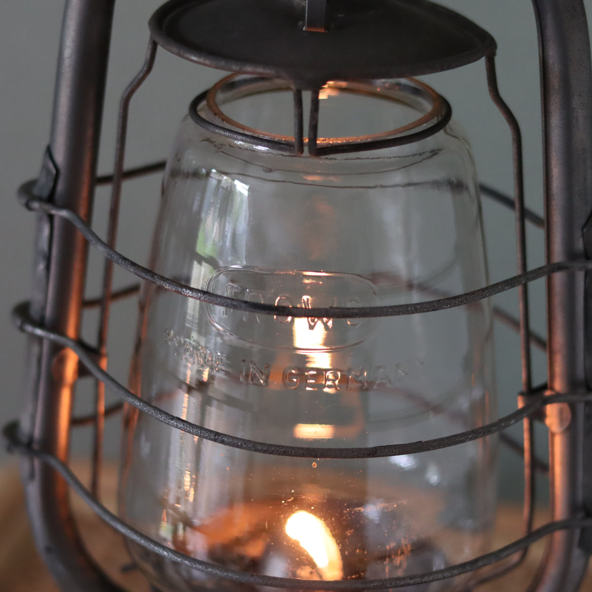 Rare Vintage Frowo Hurricane Lantern – Model No. 435 (1960s–1970s) close-up of glass and lit oil lamp flame