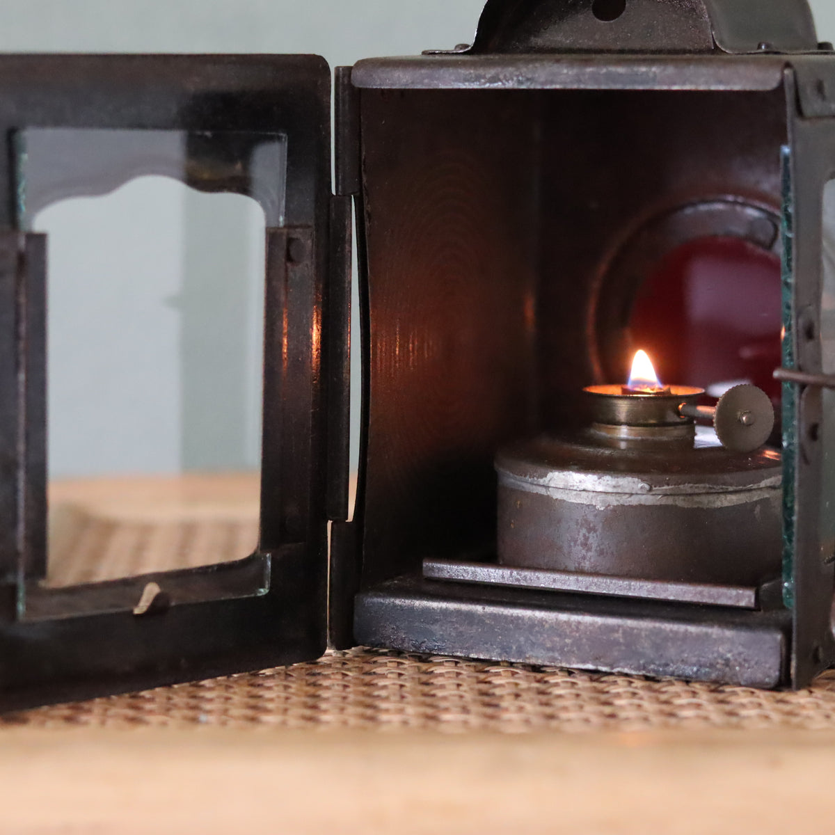 Rare Vintage Lantern – 1930s Automotive or Carriage Lamp showing an oil lamp burning inside a metal housing