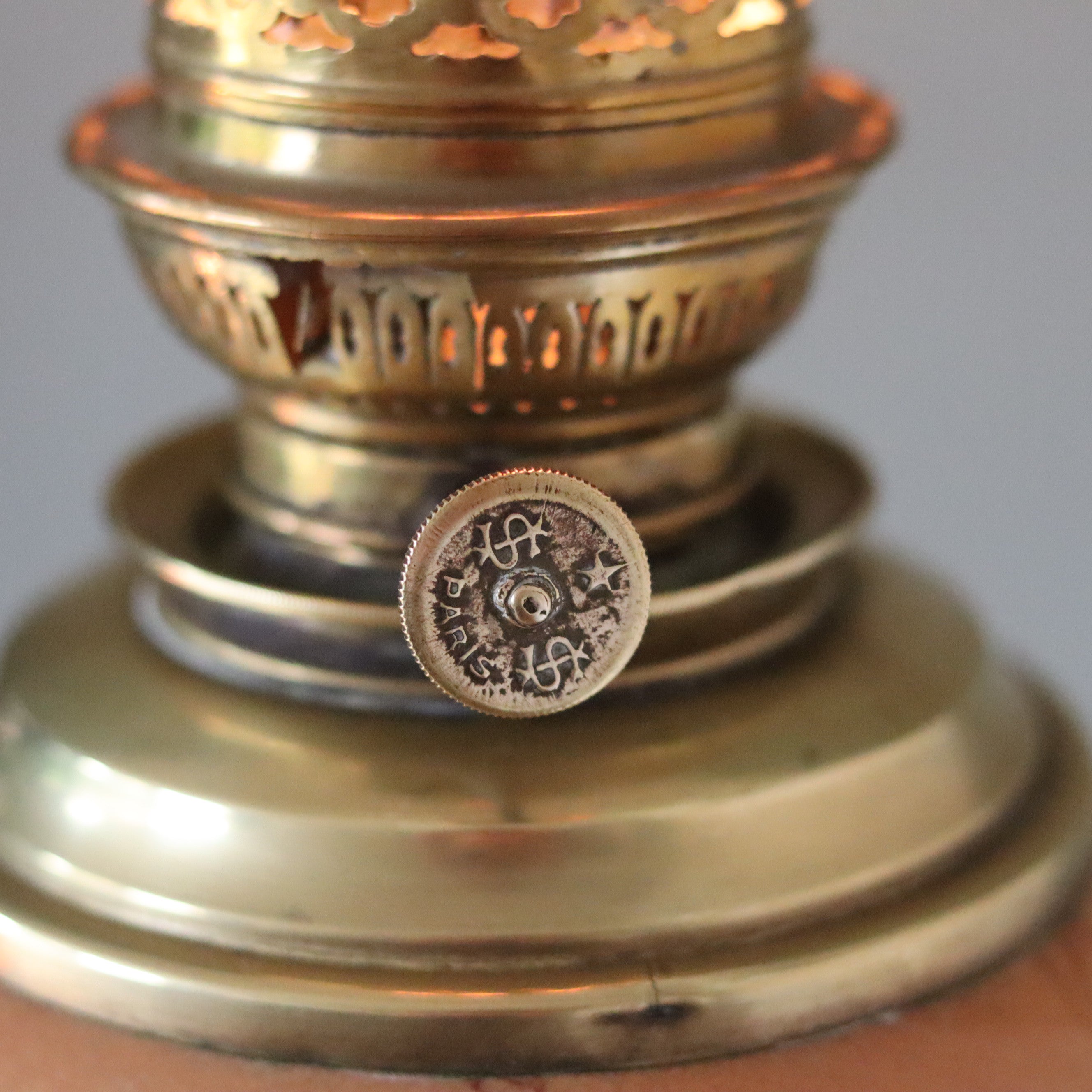 Close-up of Rare Vintage French Oil Lamp – SI Paris Burner – Brass Base & Porcelain Reservoir with Birds – 1930s showing ornate burner detail