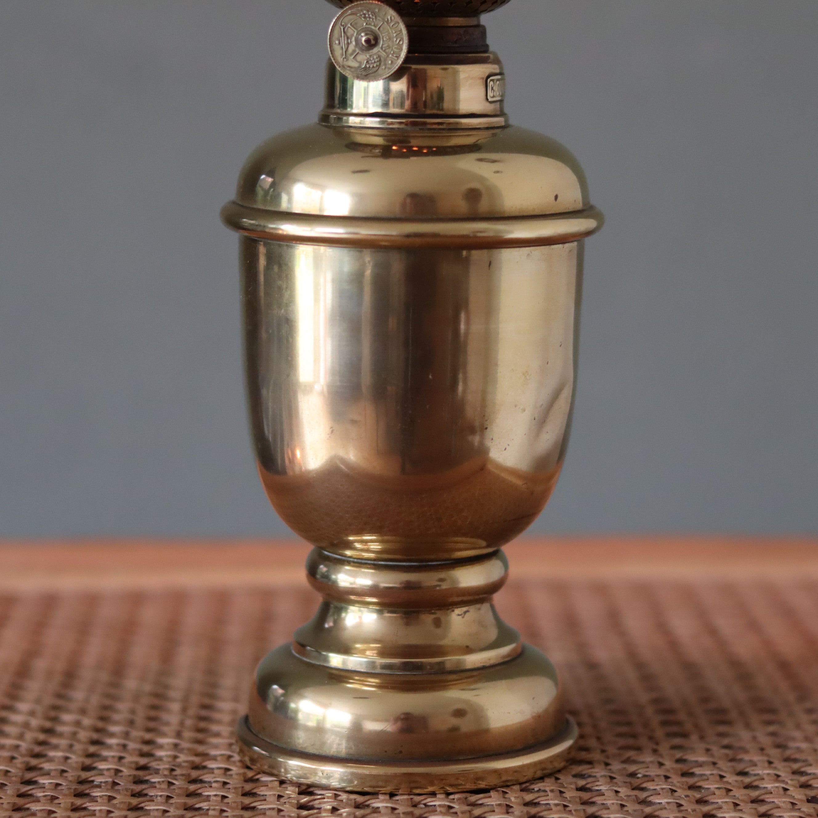 Rare Heavy Oil Lamp – C. Ouvrard Paris with Wild & Wessel Burner, Circa 1930s–1950s displaying polished metal body and base