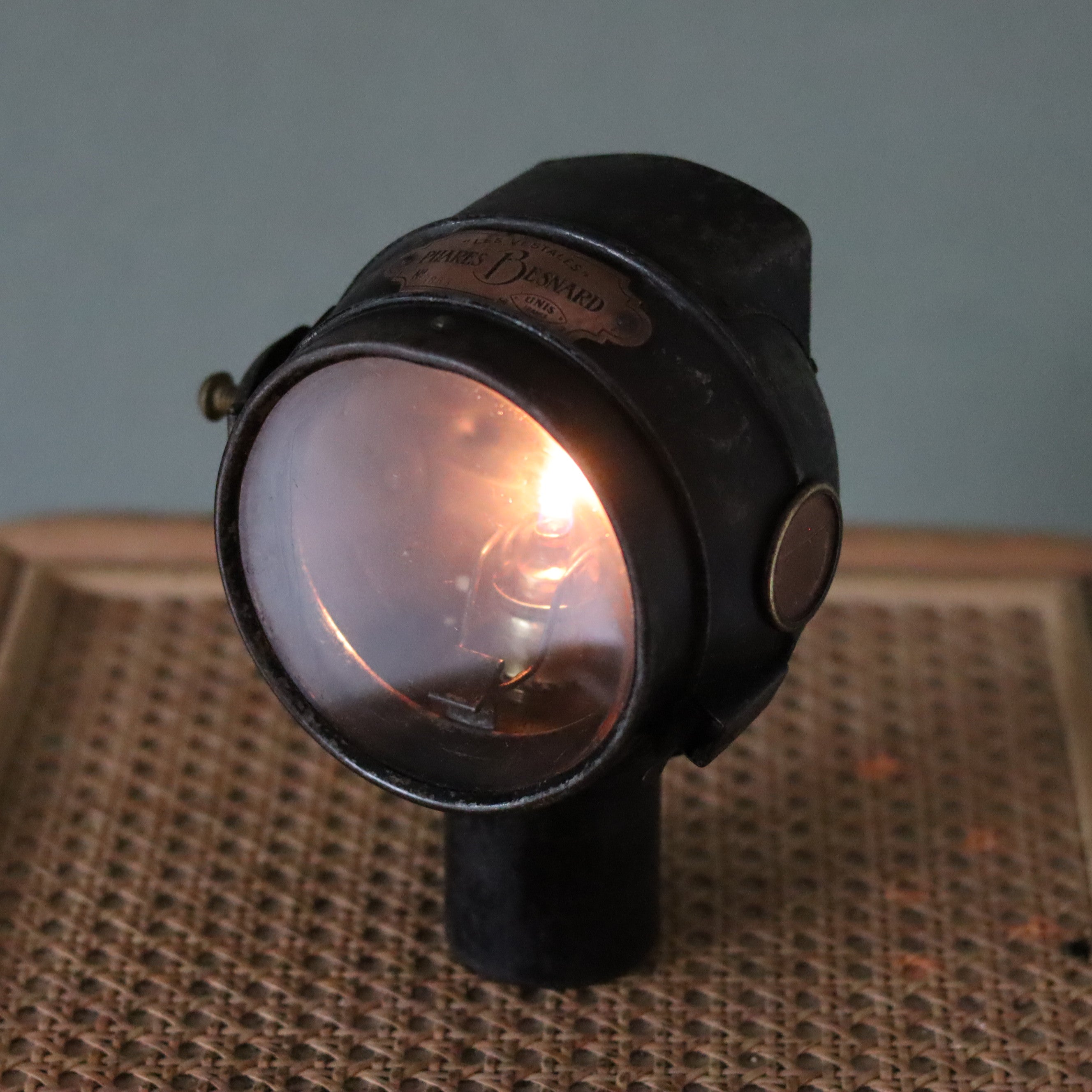 Rare Antique Car Headlamp – “Les Vestales” Phares Besnard – Paris – Circa 1910–1920 oil lamp glowing close-up view