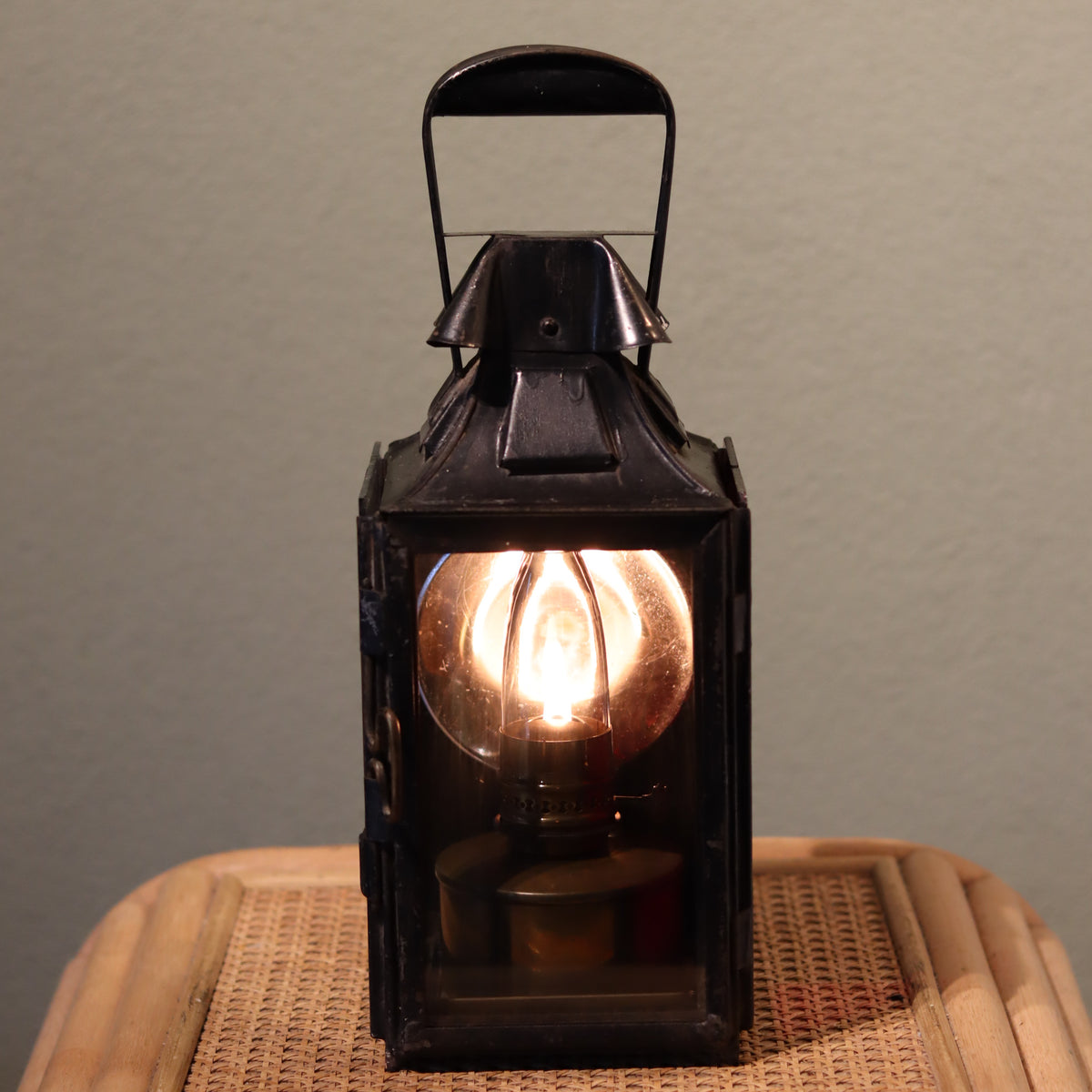 Rare Antique Railway Signal Lamp – Poyard à Paris oil lamp lit inside black metal casing, complete and functional circa 1920–1930