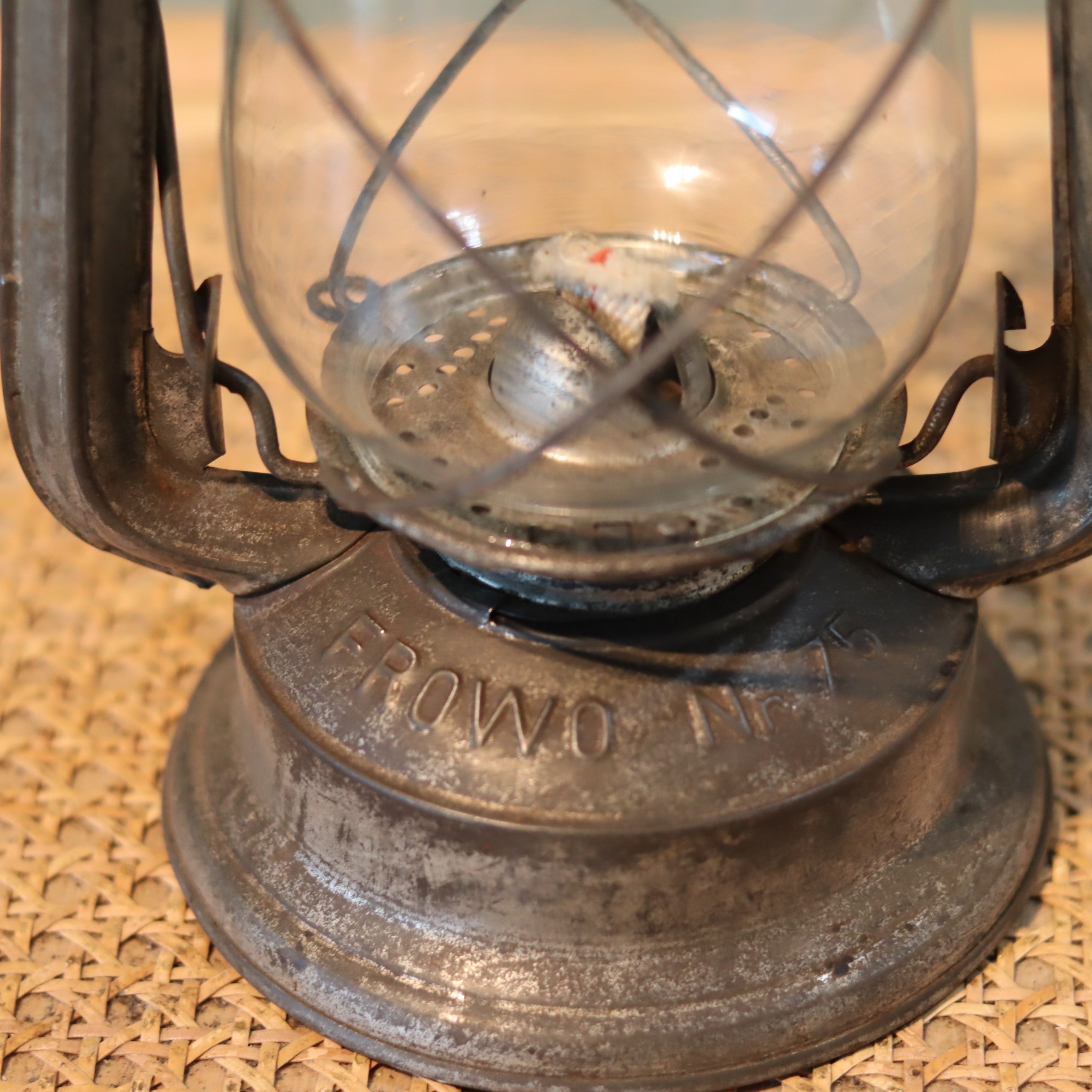 Close-up of New Old Stock Vintage Frowo Hurricane Lantern – Model 75 (1960s/70s) oil lamp base with brand engraving