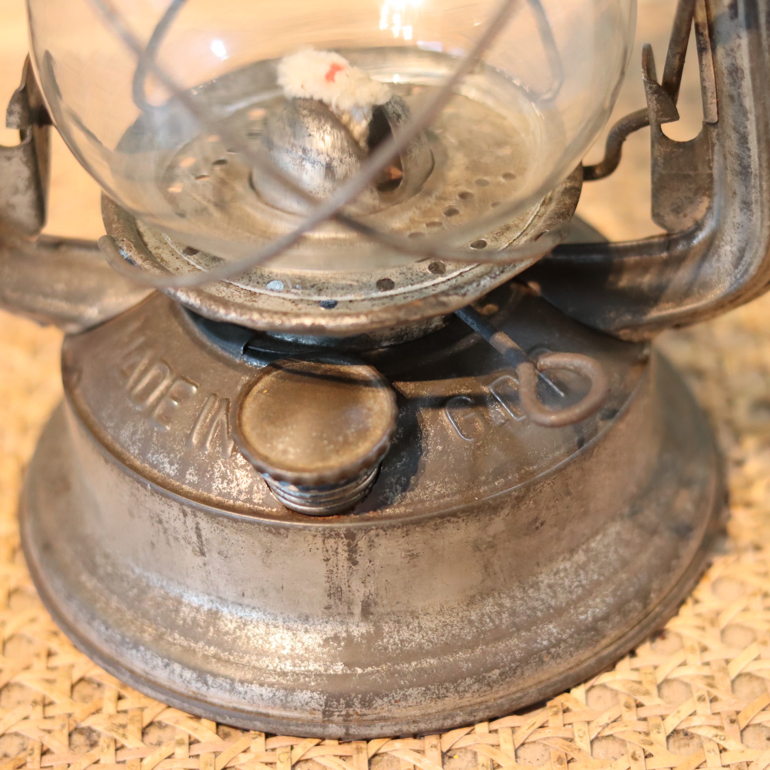 Close-up of the oil lamp base on the New Old Stock Vintage Frowo Hurricane Lantern – Model 75 (1960s/70s) showing brand details