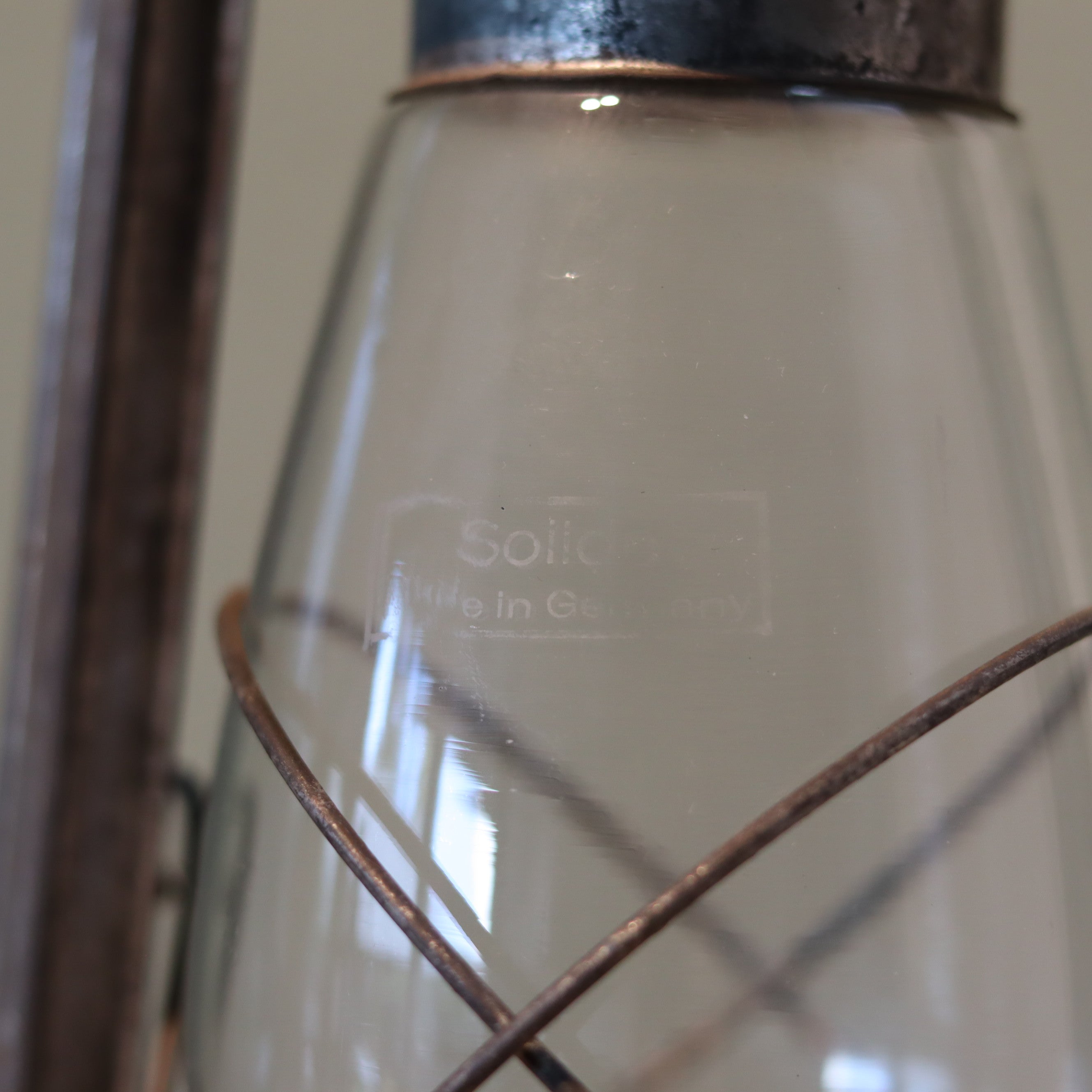 Close-up of glass and metal parts of New Old Stock Vintage Frowo Hurricane Lantern – Model 75 (1960s/70s) oil lamp