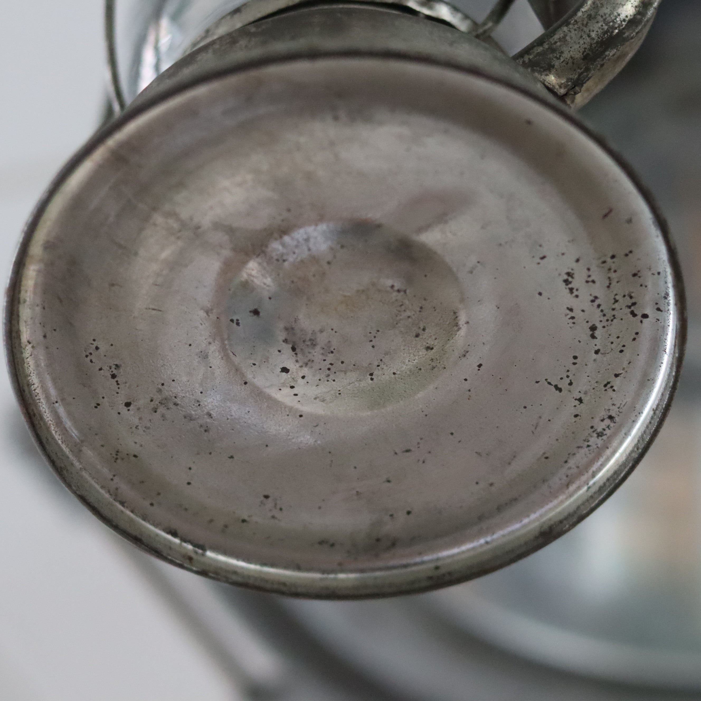 Close-up view of the metal base of the New Old Stock Vintage Frowo Hurricane Lantern – Model 75 (1960s/70s) oil lamp