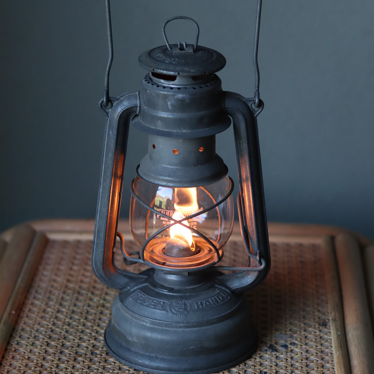 Restored Vintage Feuerhand Baby 275 Hurricane Lantern – Western Germany oil lamp glowing with flame and German craftsmanship details