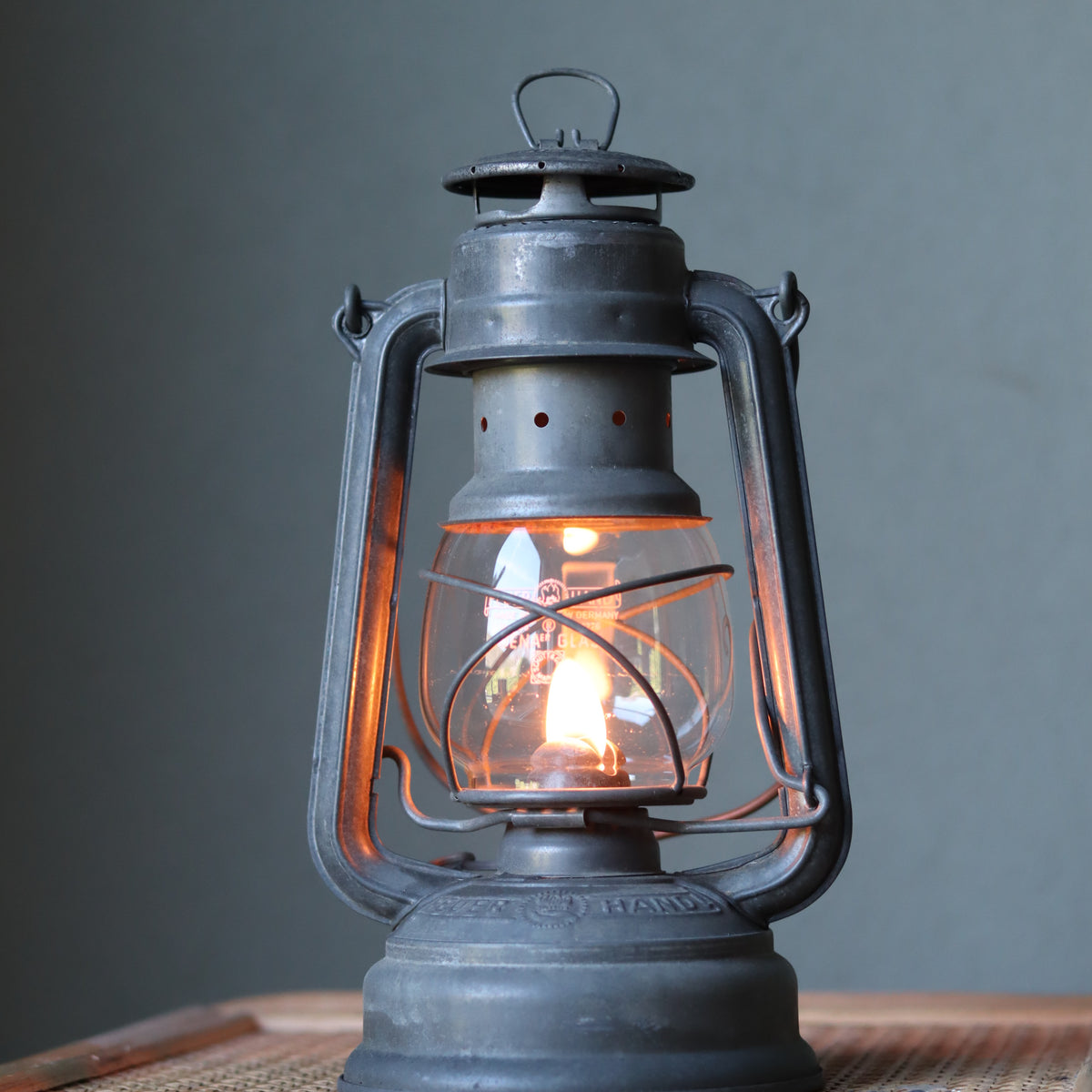 Restored Vintage Feuerhand Baby 275 Hurricane Lantern – Western Germany glowing oil lamp showcasing classic German design and craftsmanship