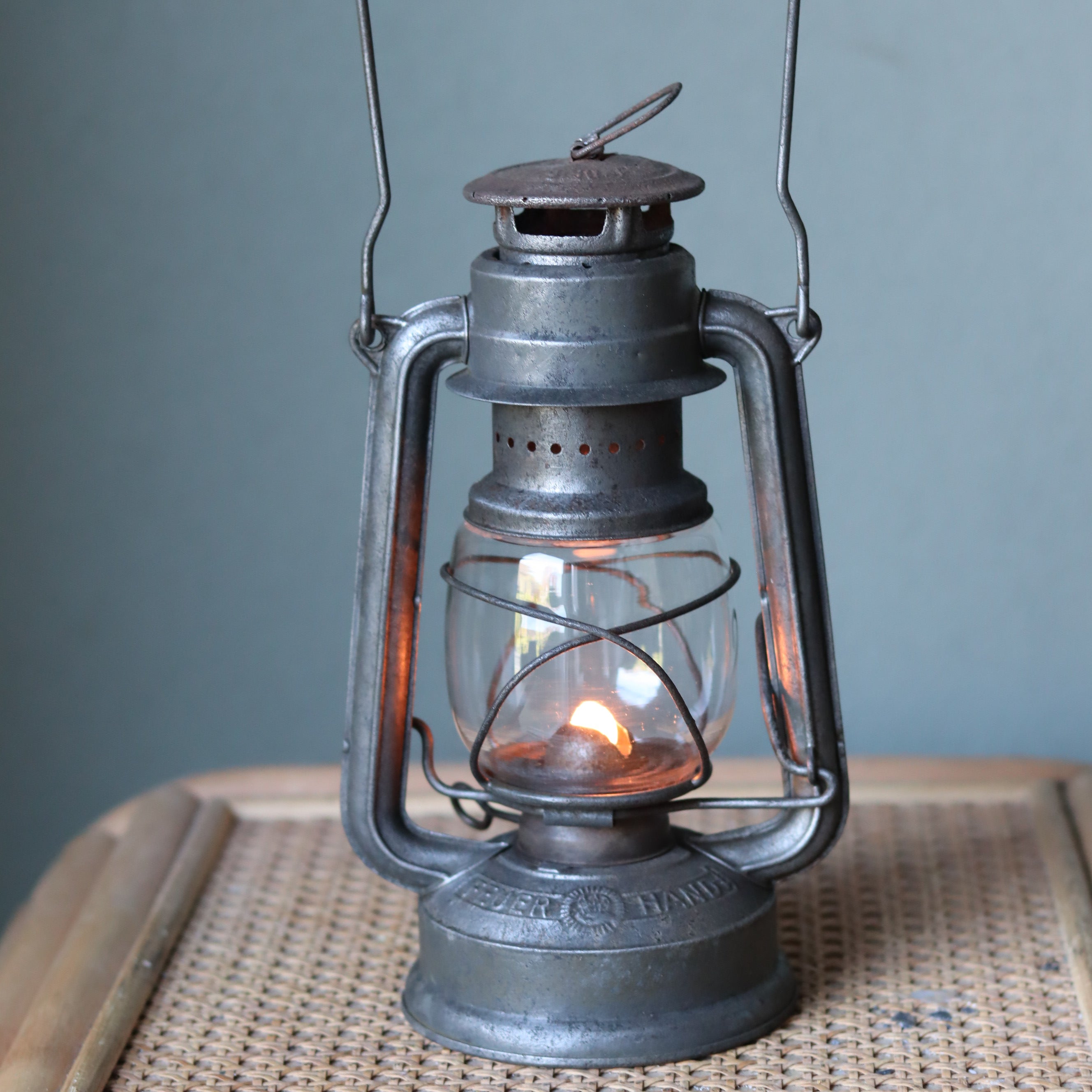 Vintage Feuerhand Baby 275 Hurricane Lantern – Western Germany, 1950s, Karlsruhe Marking oil lamp with glowing flame and metal frame