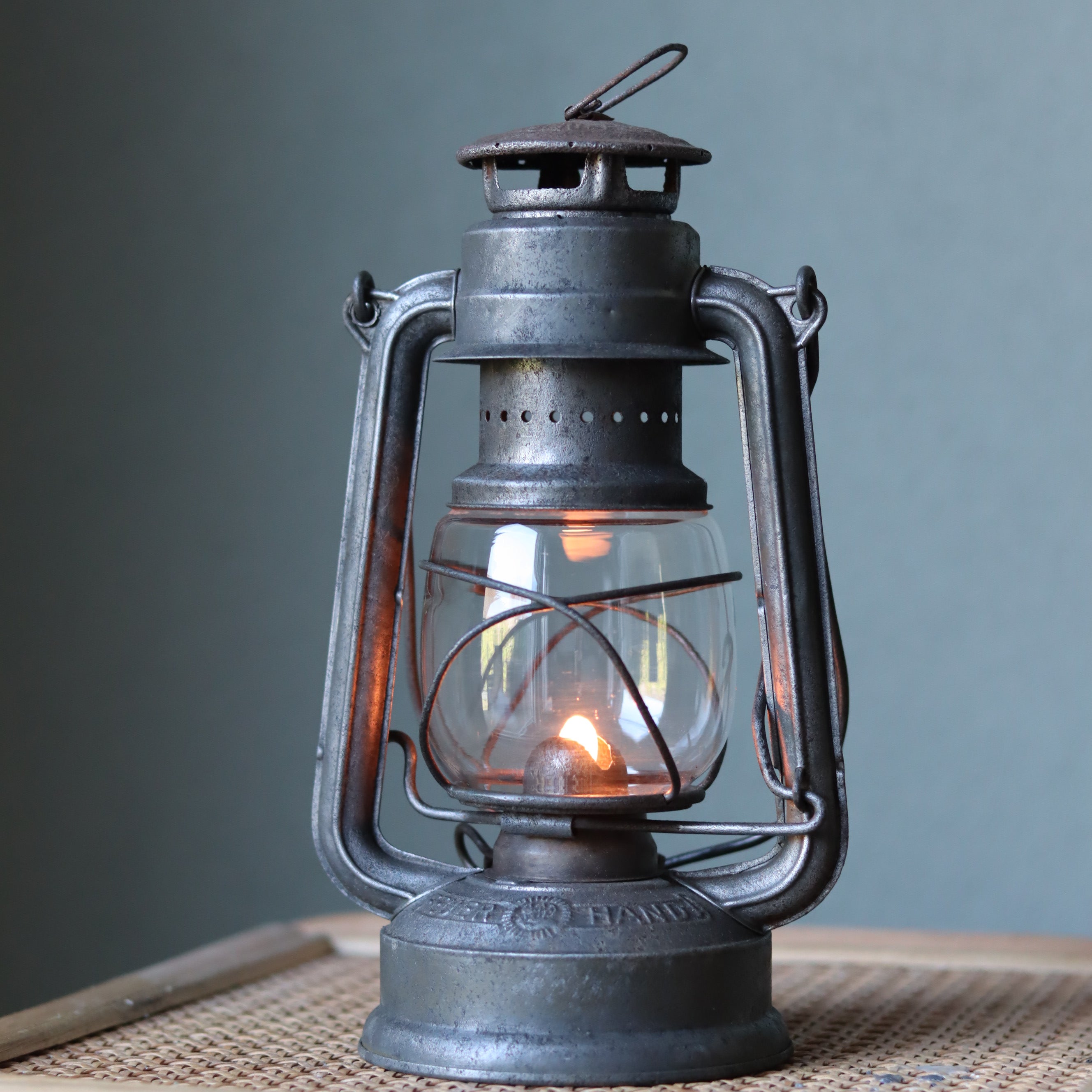 Vintage Feuerhand Baby 275 Hurricane Lantern – Western Germany, 1950s, Karlsruhe Marking oil lamp with lit flame and metal frame