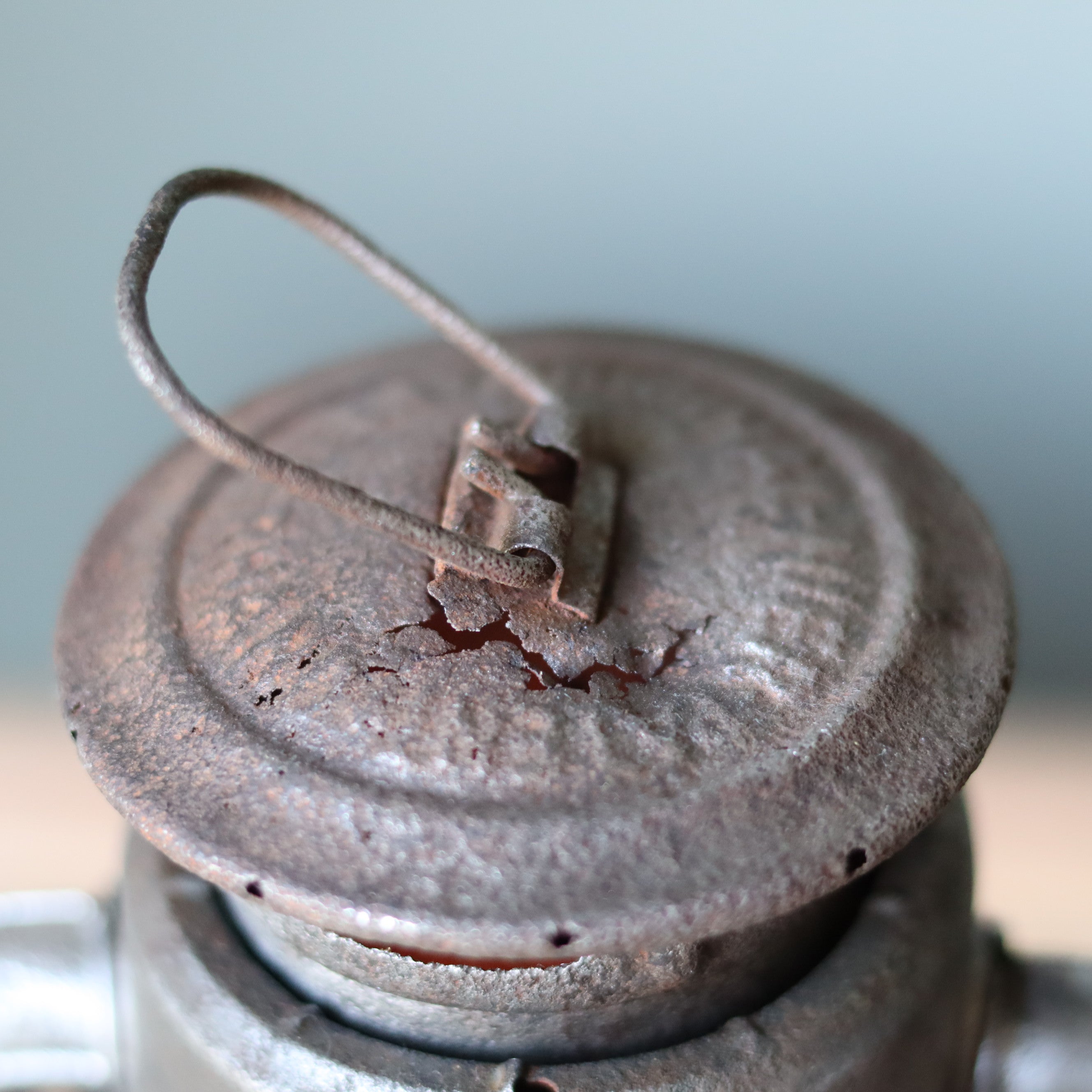 Vintage Feuerhand Baby 275 Hurricane Lantern – Western Germany, 1950s, Karlsruhe Marking close-up of rusted lid and handle of oil lamp