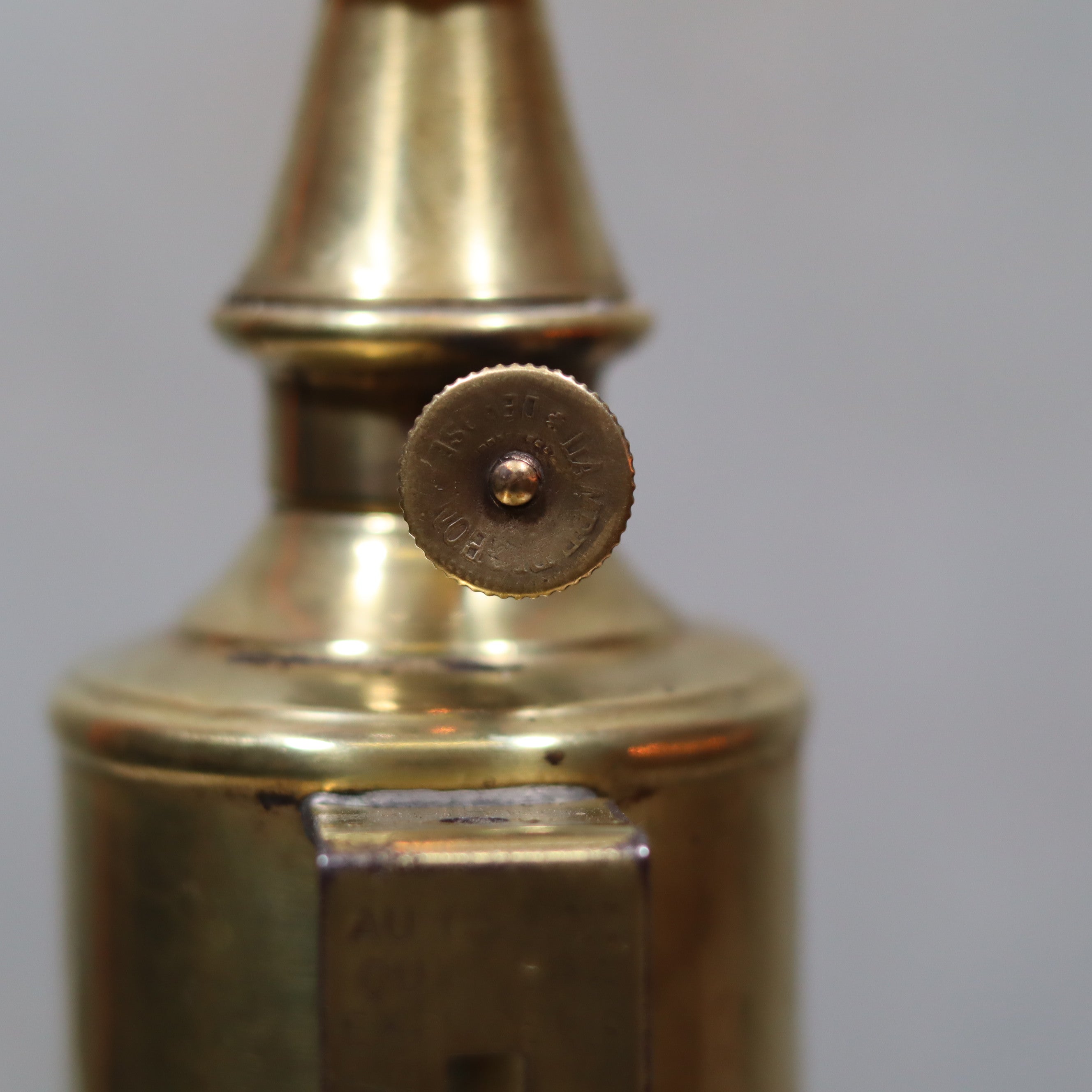 Close-up view of Rare Antique Oil Lamp – Early Pigeon Lamp (Circa 1900) brass wick adjuster detail