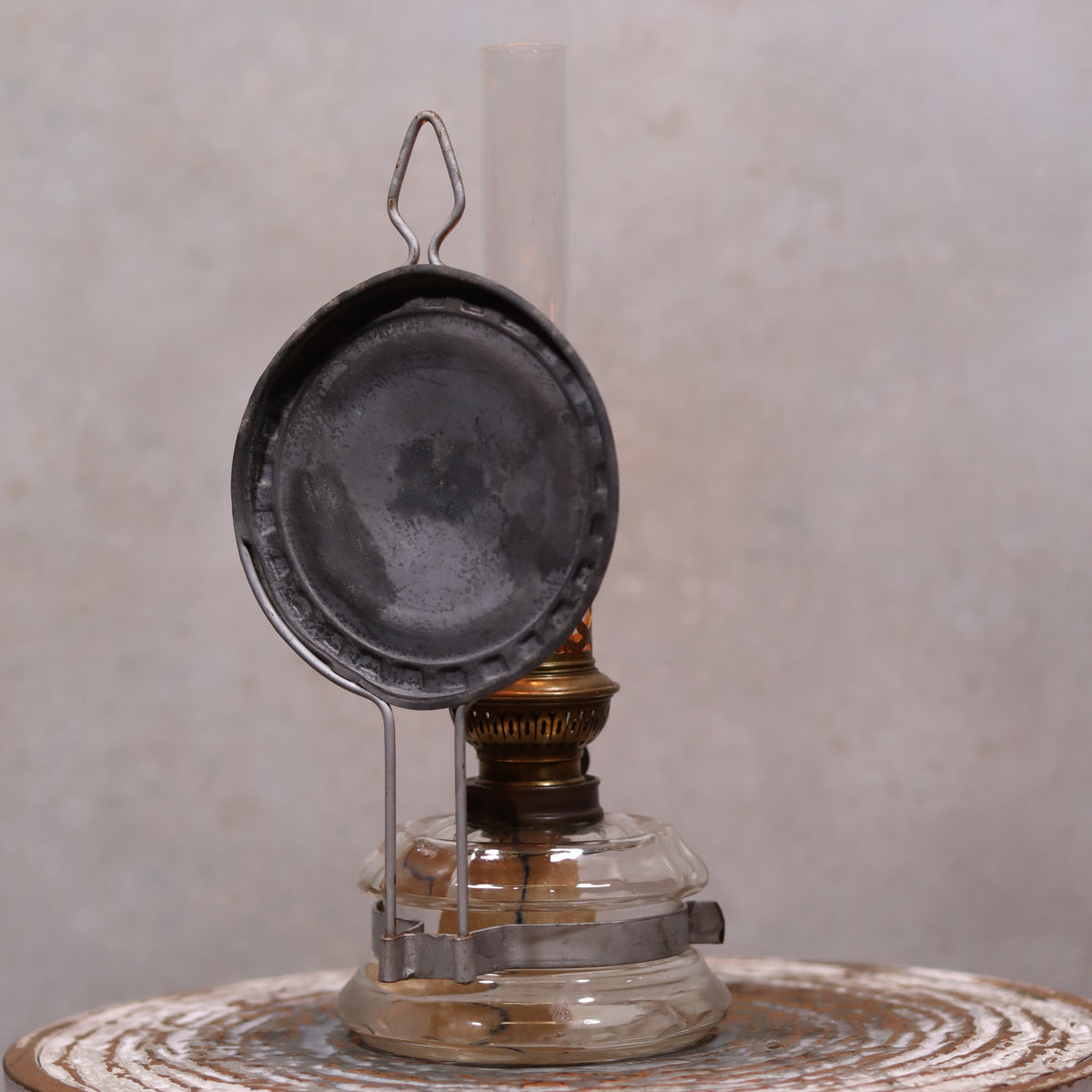 Vintage Oil Lamp – Classic Wall or Kitchen Lamp with Silver Reflector showcasing a timeless, elegant design with glass and metal elements.