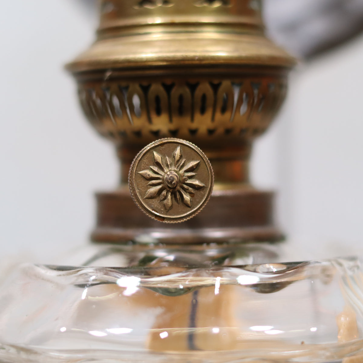 Vintage Oil Lamp – Classic Wall or Kitchen Lamp with Silver Reflector detailed close-up of ornate brass adjustment knob and glass base
