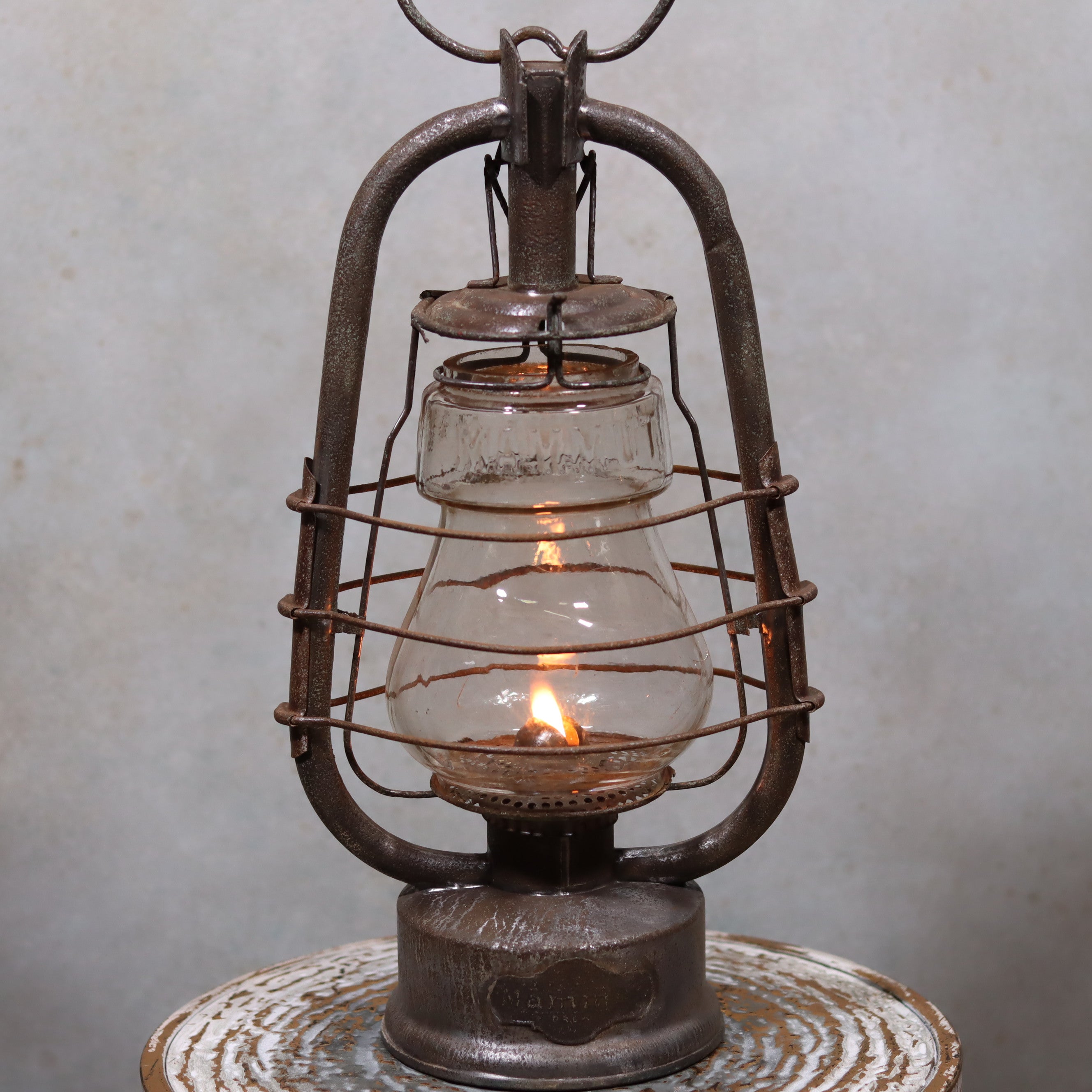 Rare German Hurricane Lantern – Mammut by Lohmann & Ruhland (Circa 1910) vintage oil lamp with protective metal frame and glowing flame