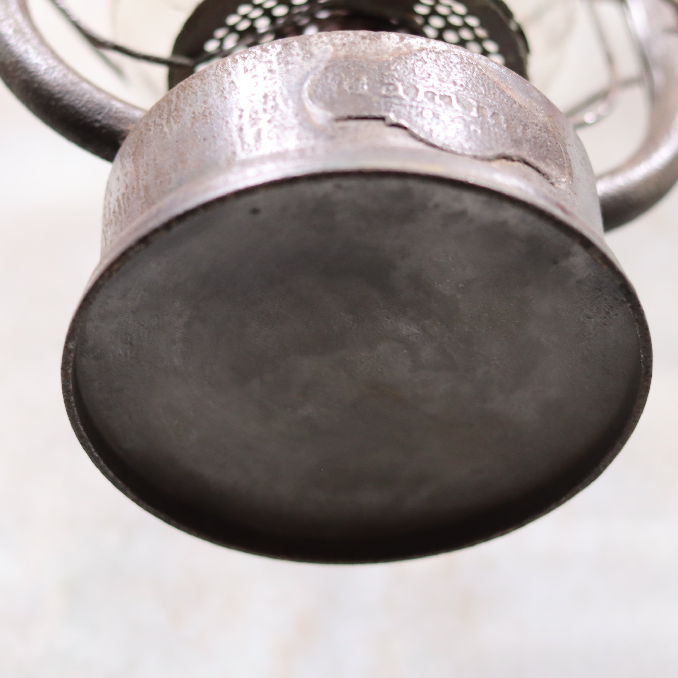 Base view of the Rare German Hurricane Lantern – Mammut by Lohmann & Ruhland (Circa 1910) oil lamp showing metal details