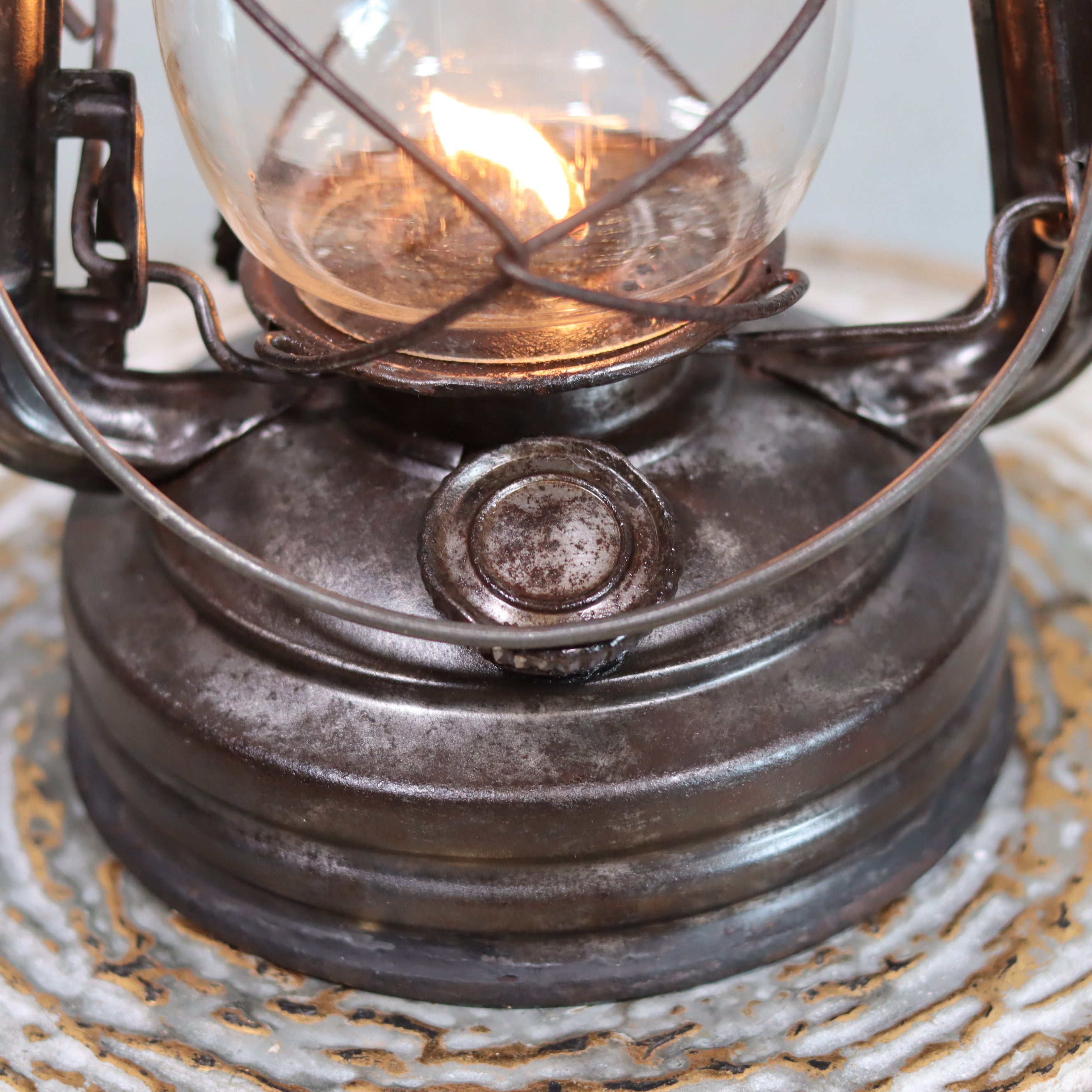 Vintage French ALG No. 6 Hurricane Lantern – Cristal Supérieur Glass (1930s) oil lamp with lit flame and metal base detail
